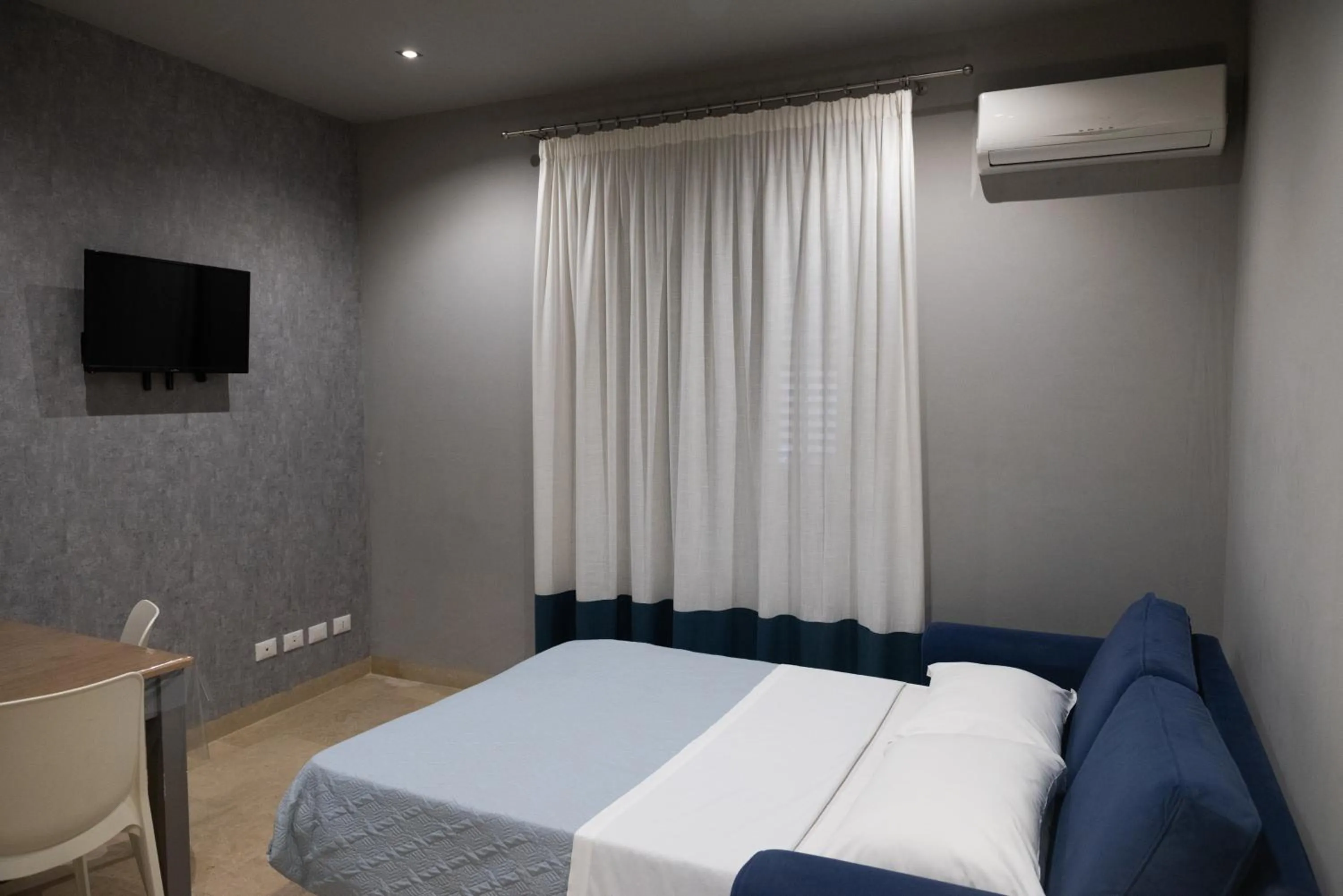 Living room, Bed in ZIBIBBO SUITES & ROOMS - Aparthotel in Centro Storico a Trapani