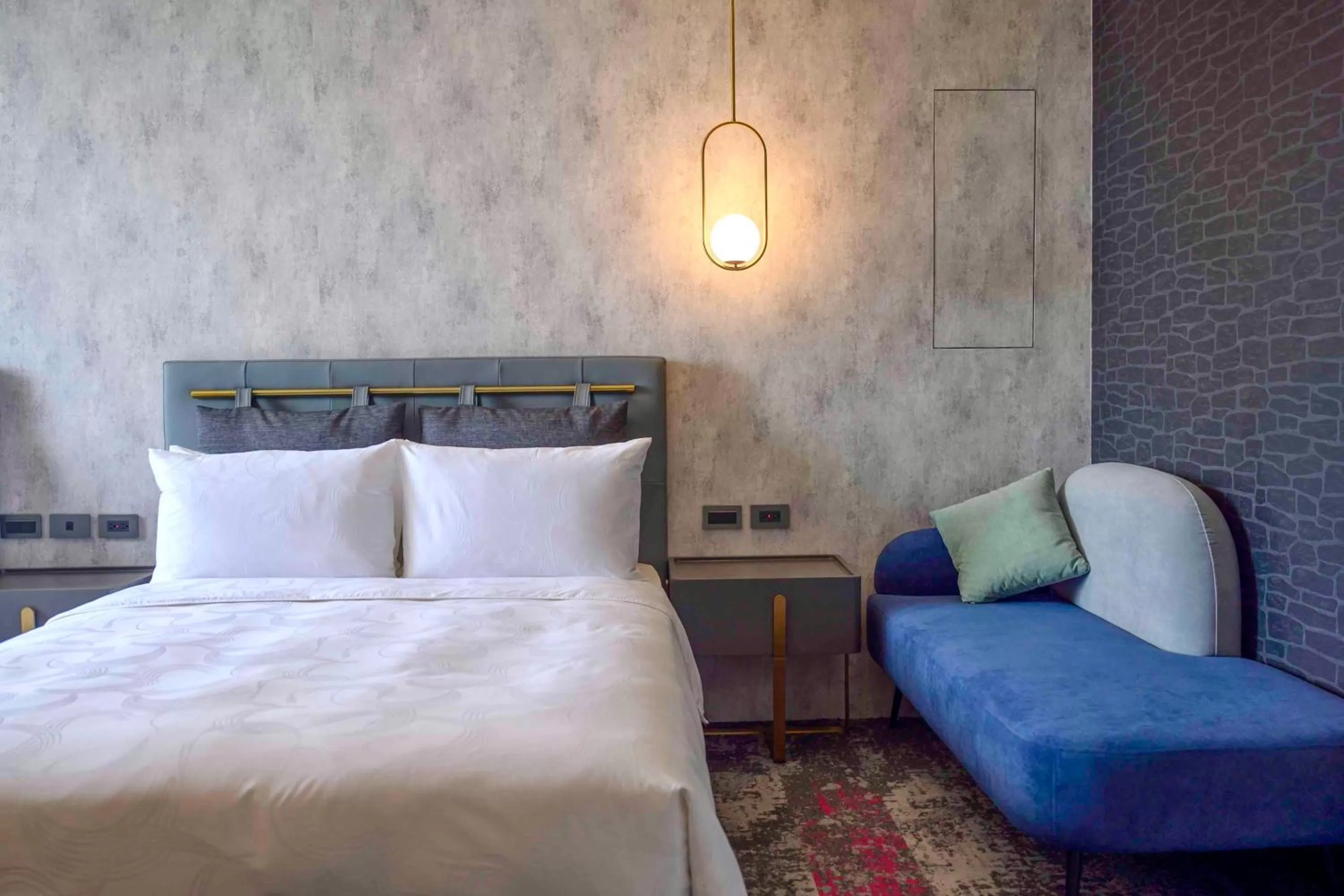 Bed in Tenz Go Hotel