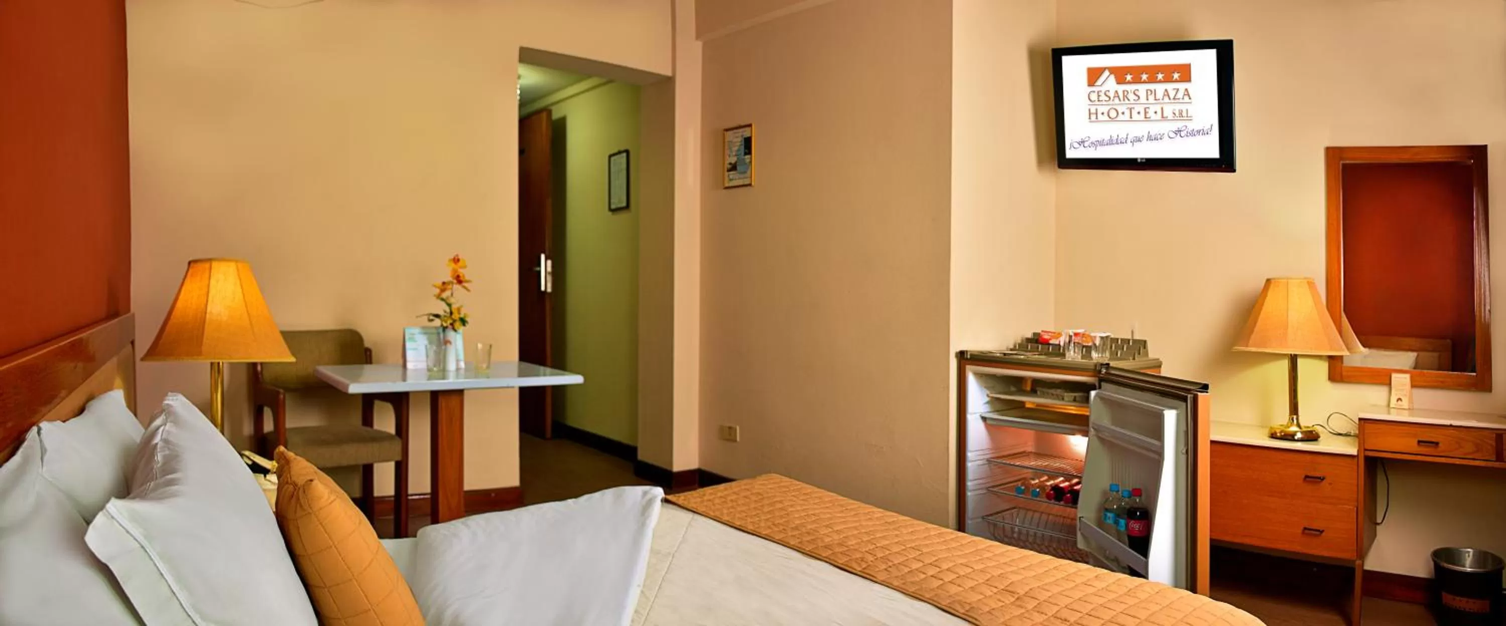 Bed in Cesar's Plaza Hotel