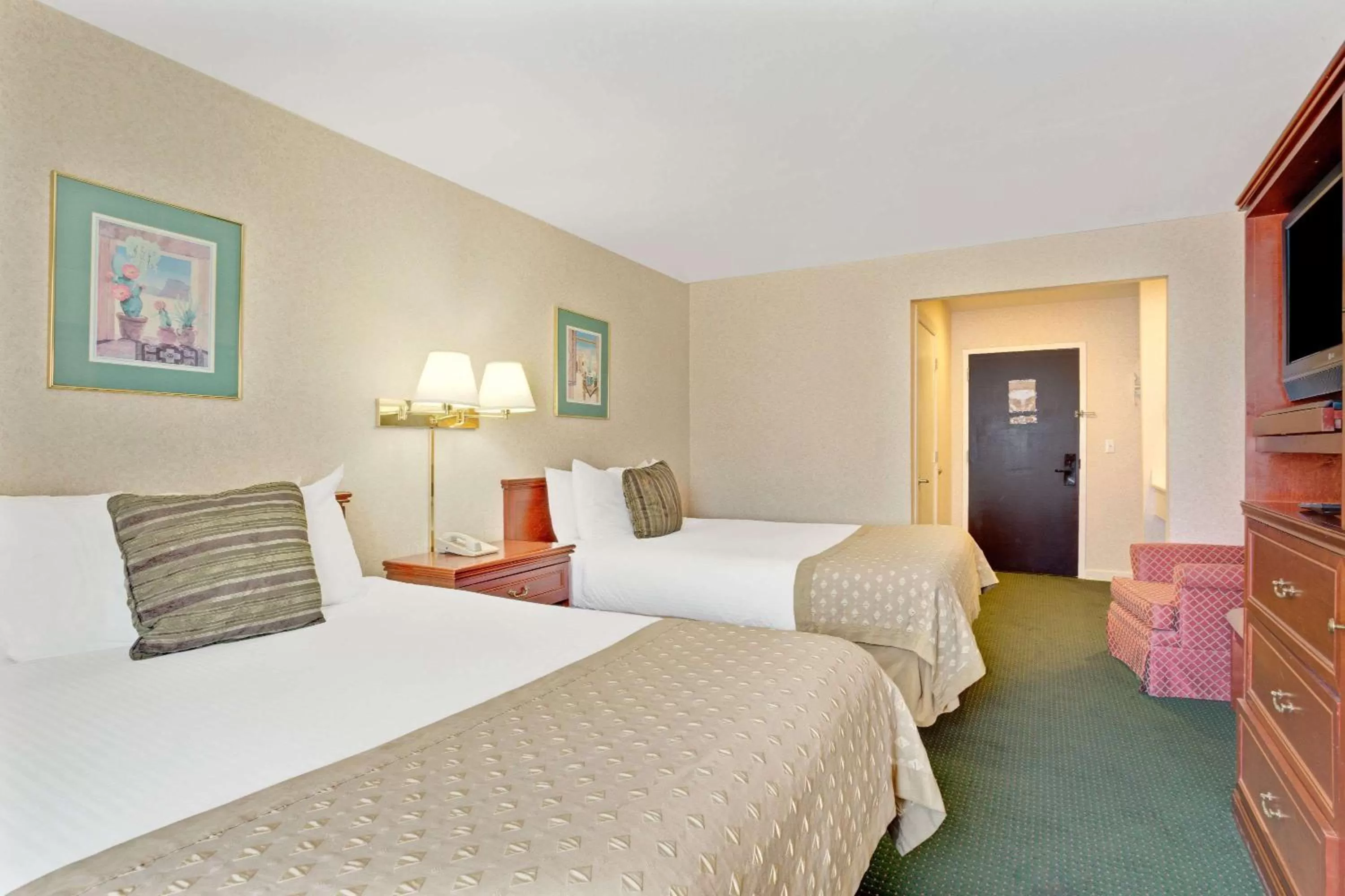 Photo of the whole room, Bed in Ramada by Wyndham Draper, Utah
