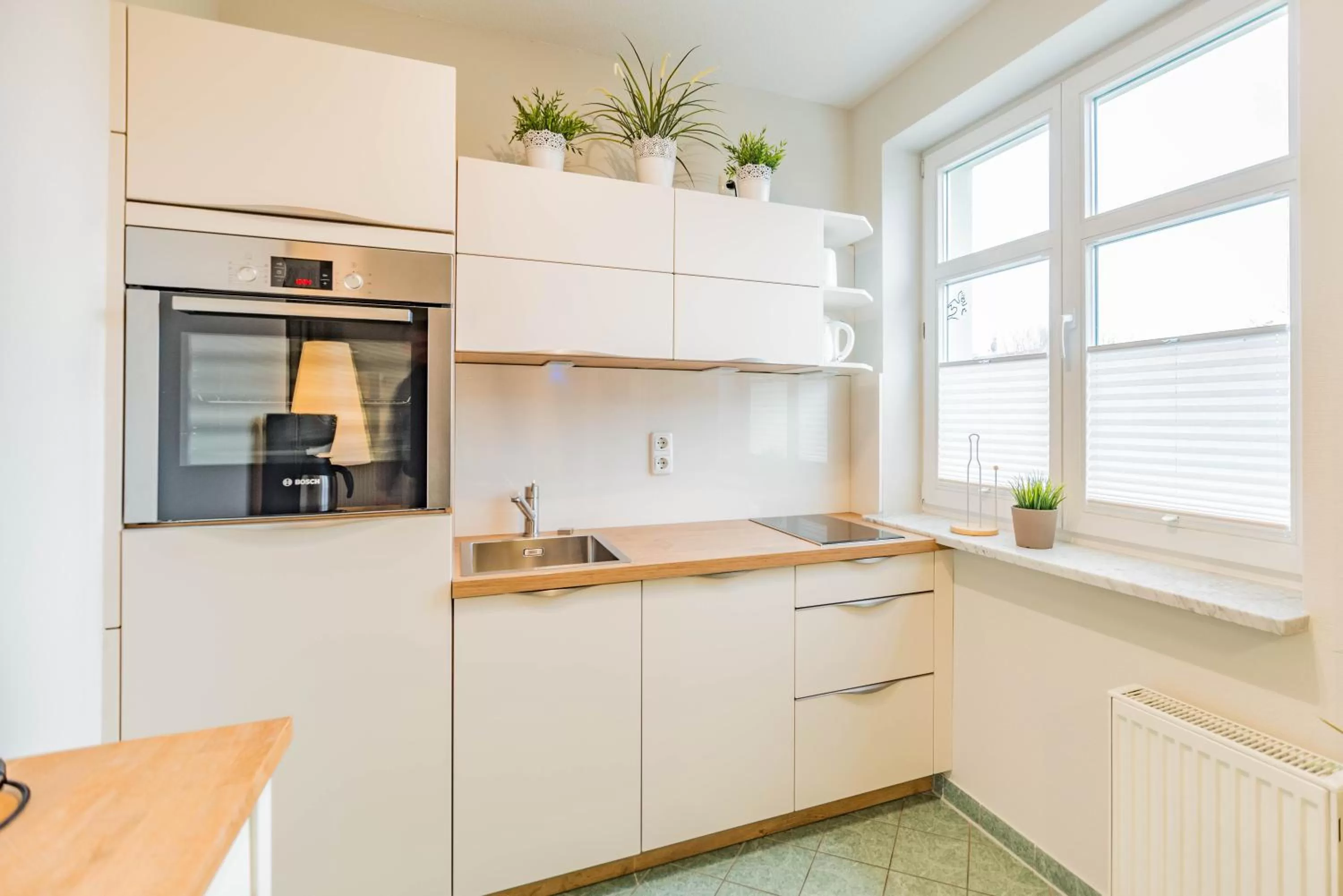 Photo of the whole room, Kitchen/Kitchenette in Am Weststrand Apartmenthaus Waldeck