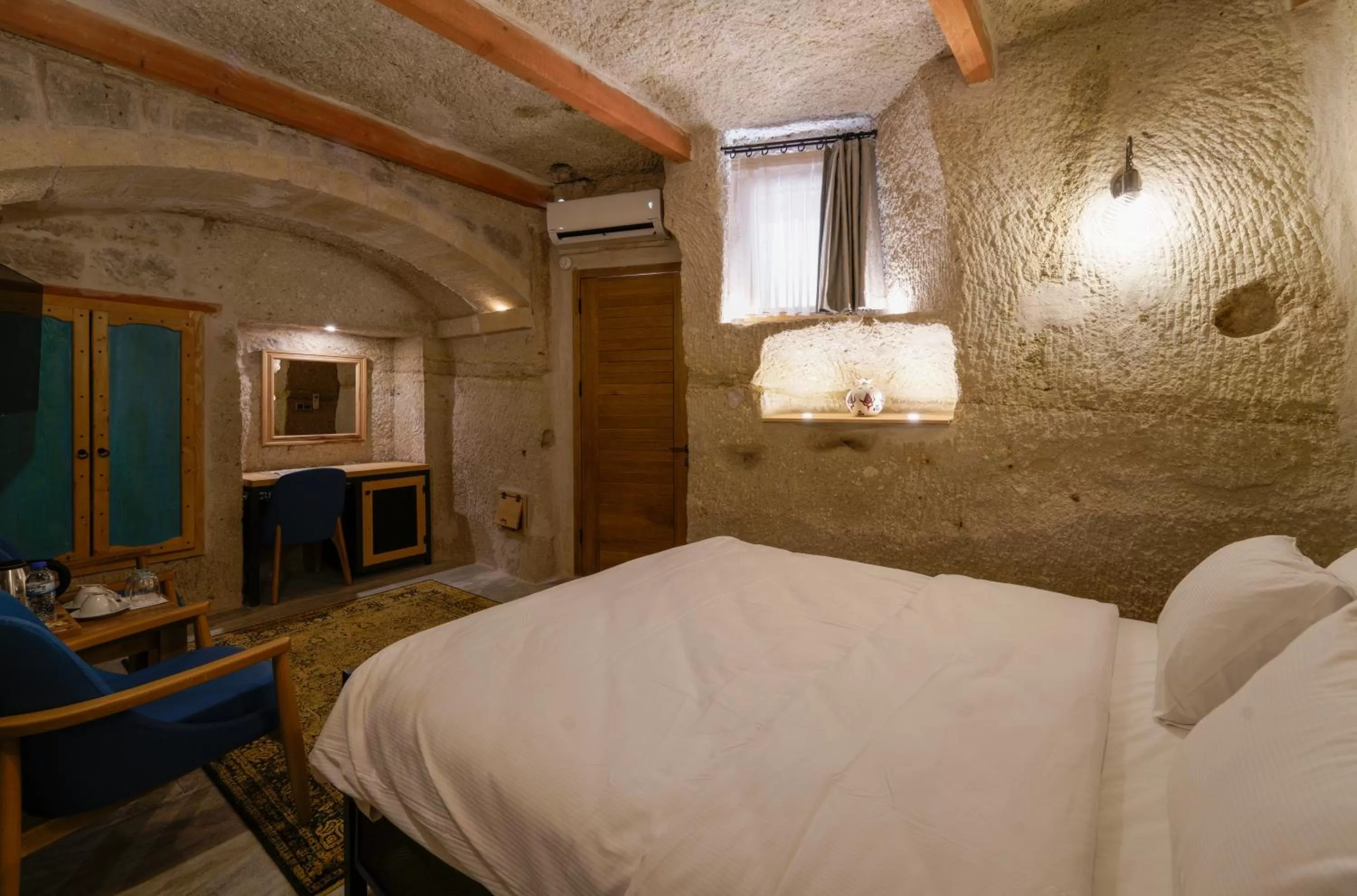 Bed in The Niche Cave Hotel