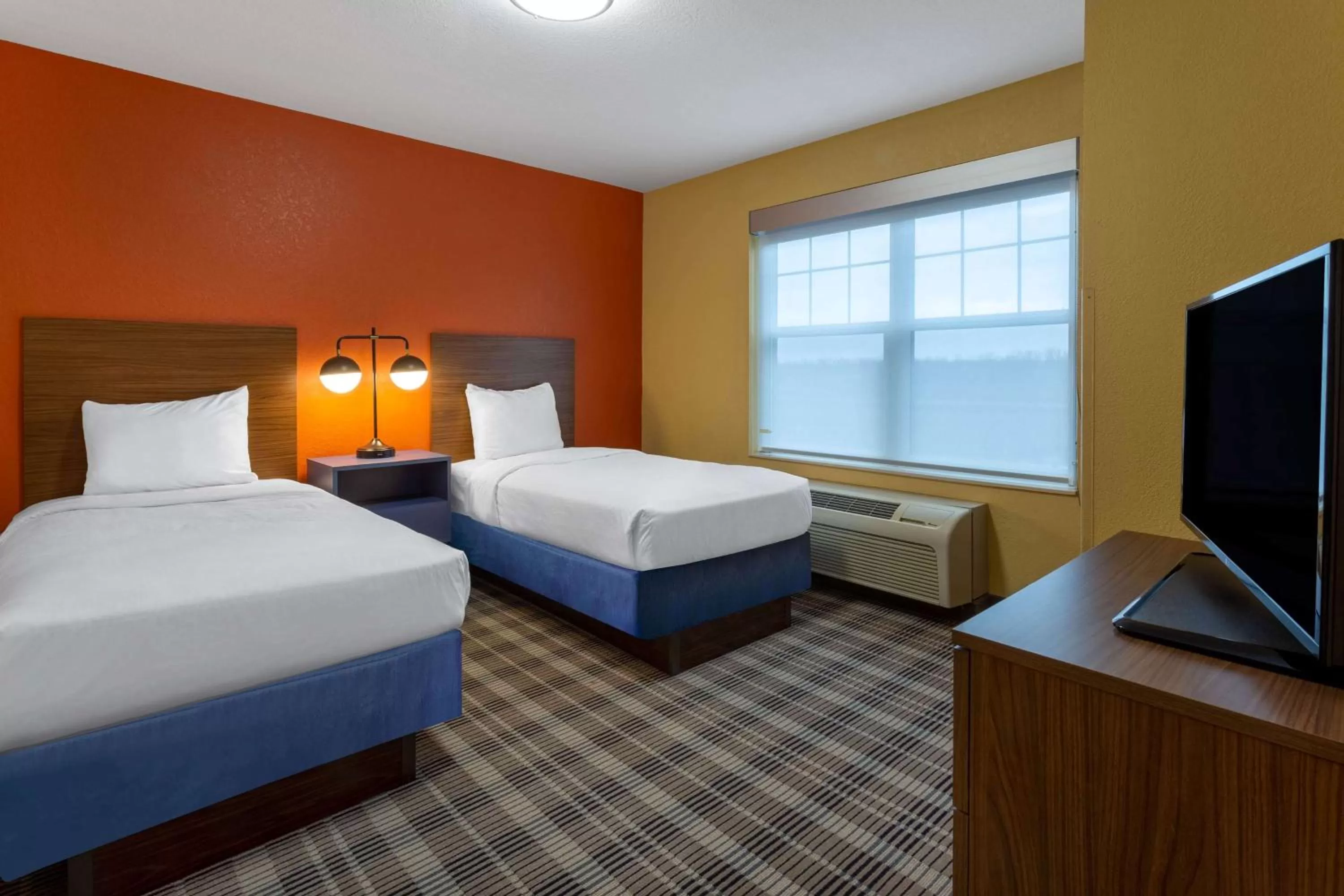Photo of the whole room, Bed in AmericInn by Wyndham Fulton Clinton