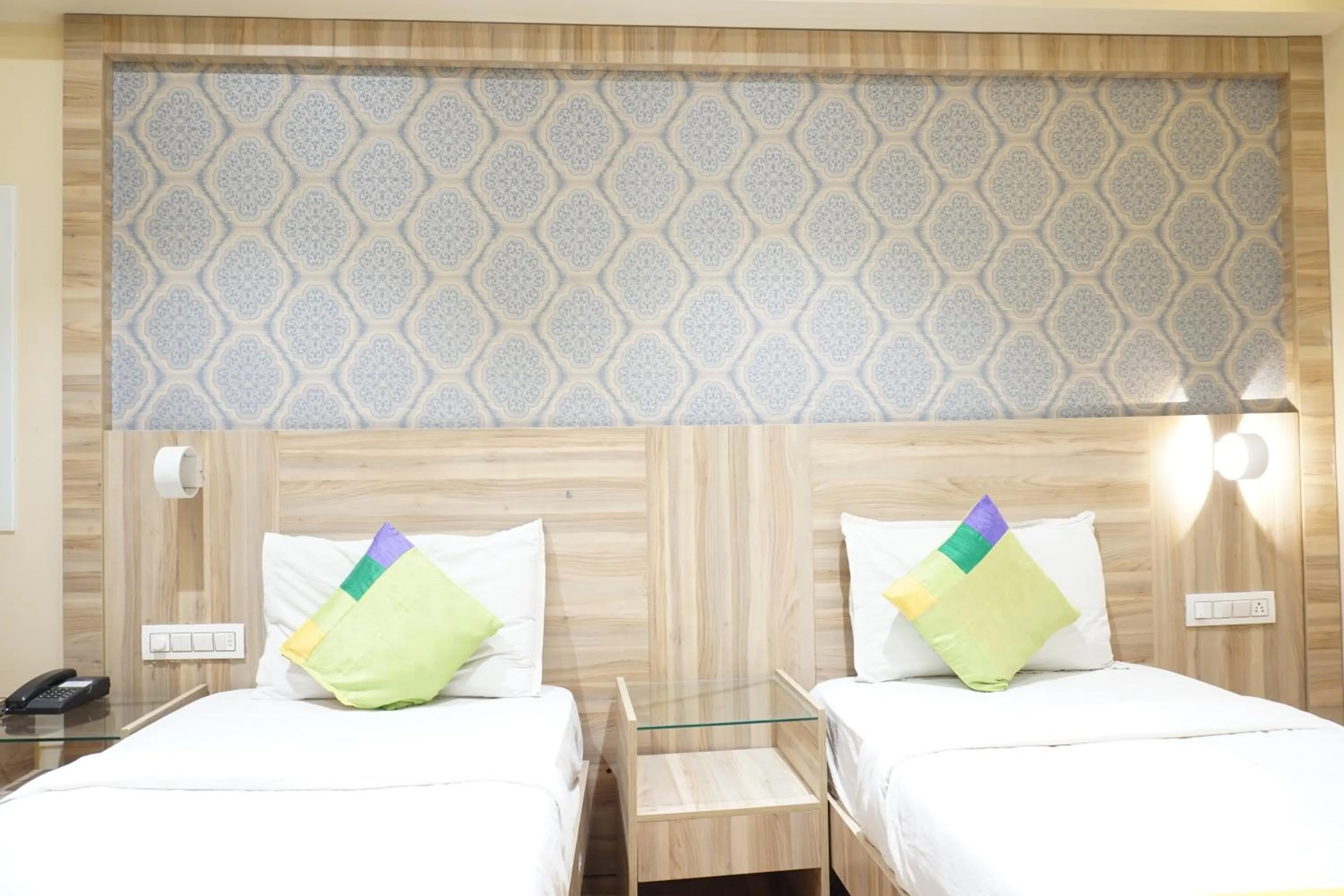 Bedroom, Bed in Treebo Classic Grande, Camp