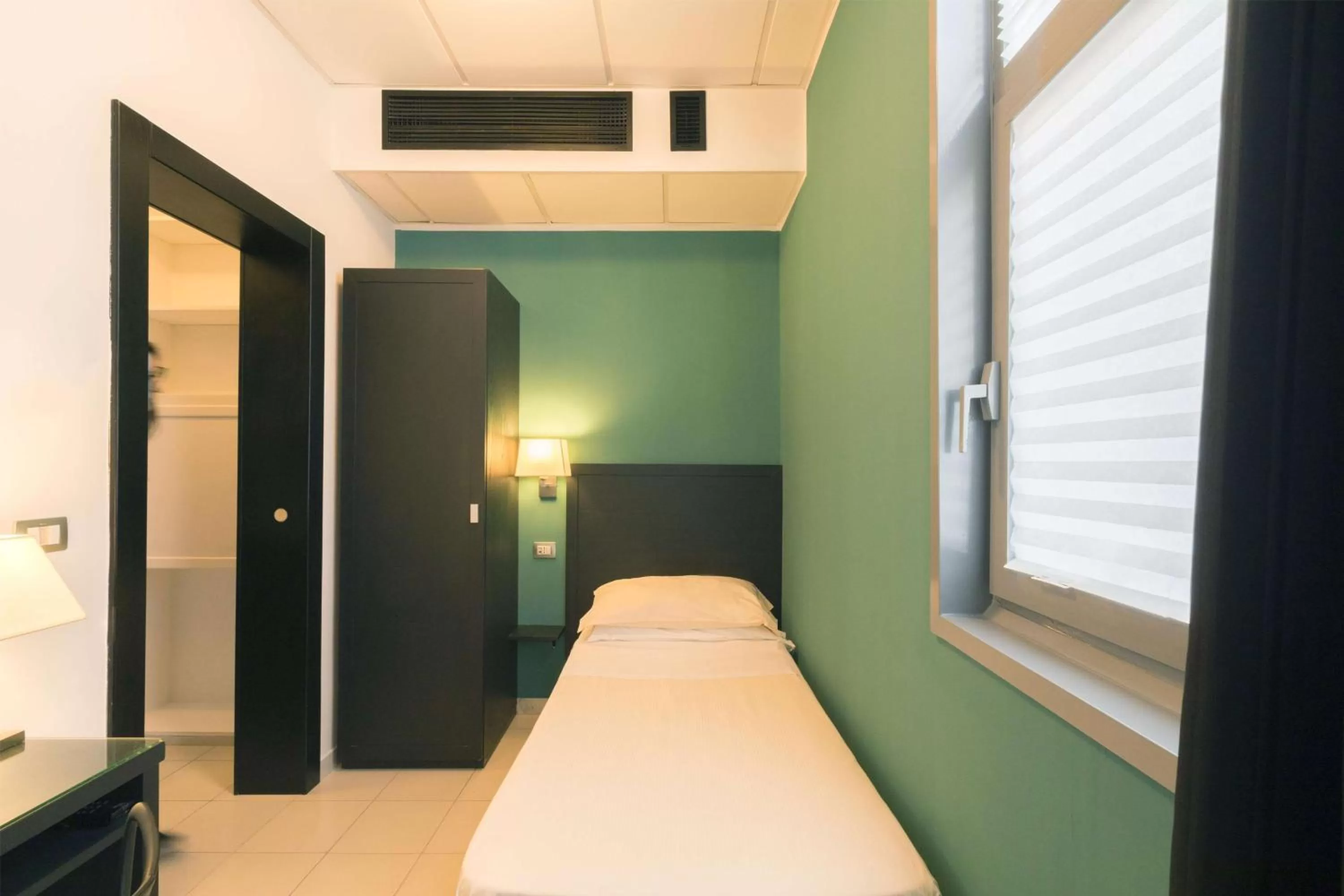 Photo of the whole room, Bed in Executive Business Hotel