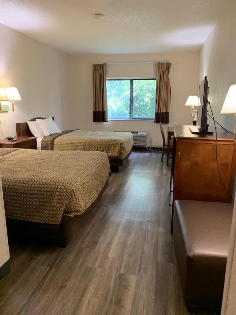 Bed in Days Inn by Wyndham Topeka