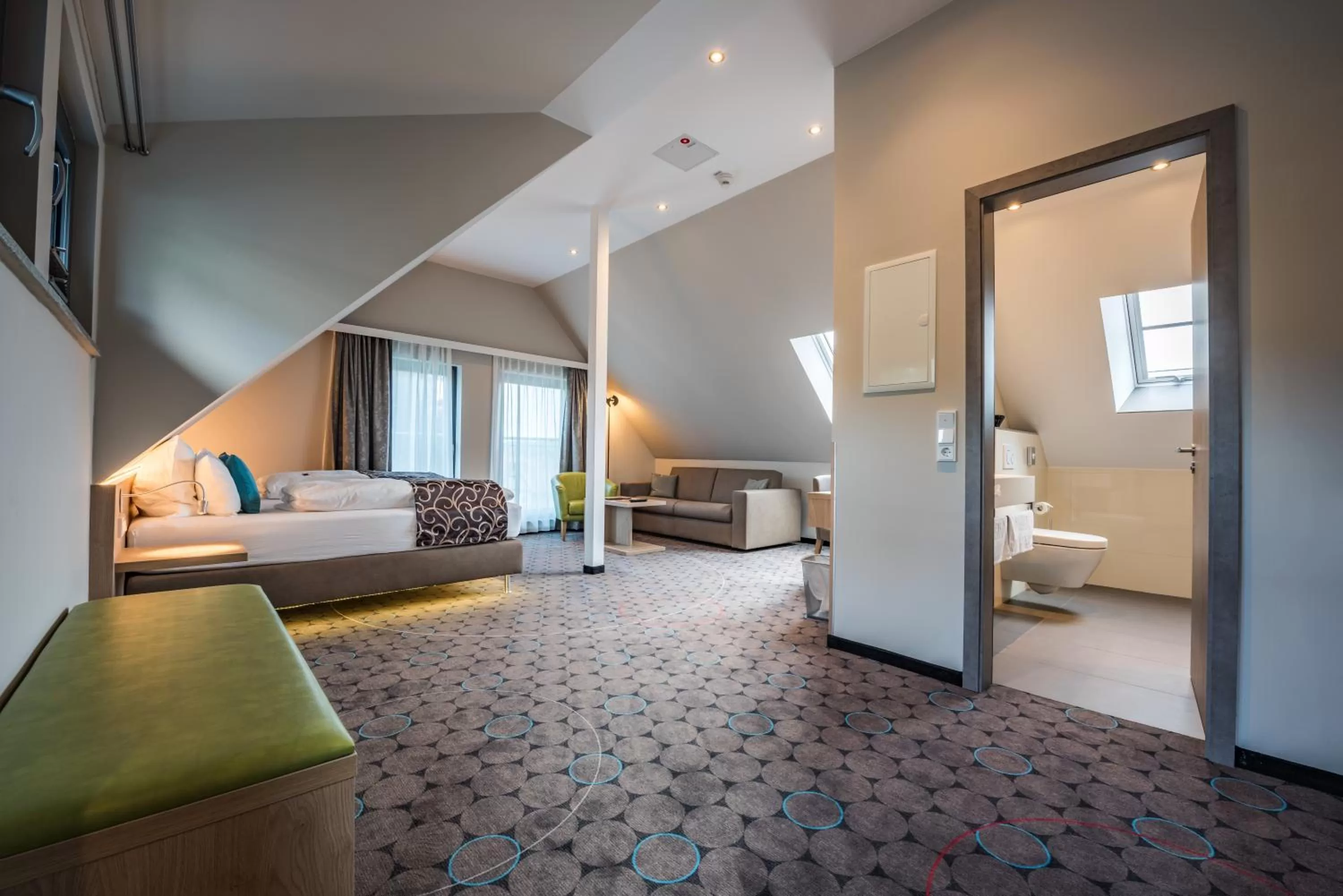 Photo of the whole room, Bed in AKZENT Hotel Villa Saxer