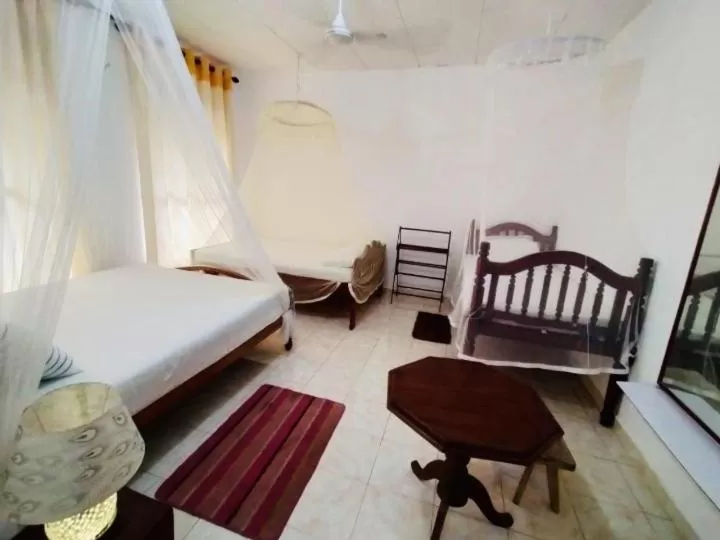 Bed in Kadolana Guest House