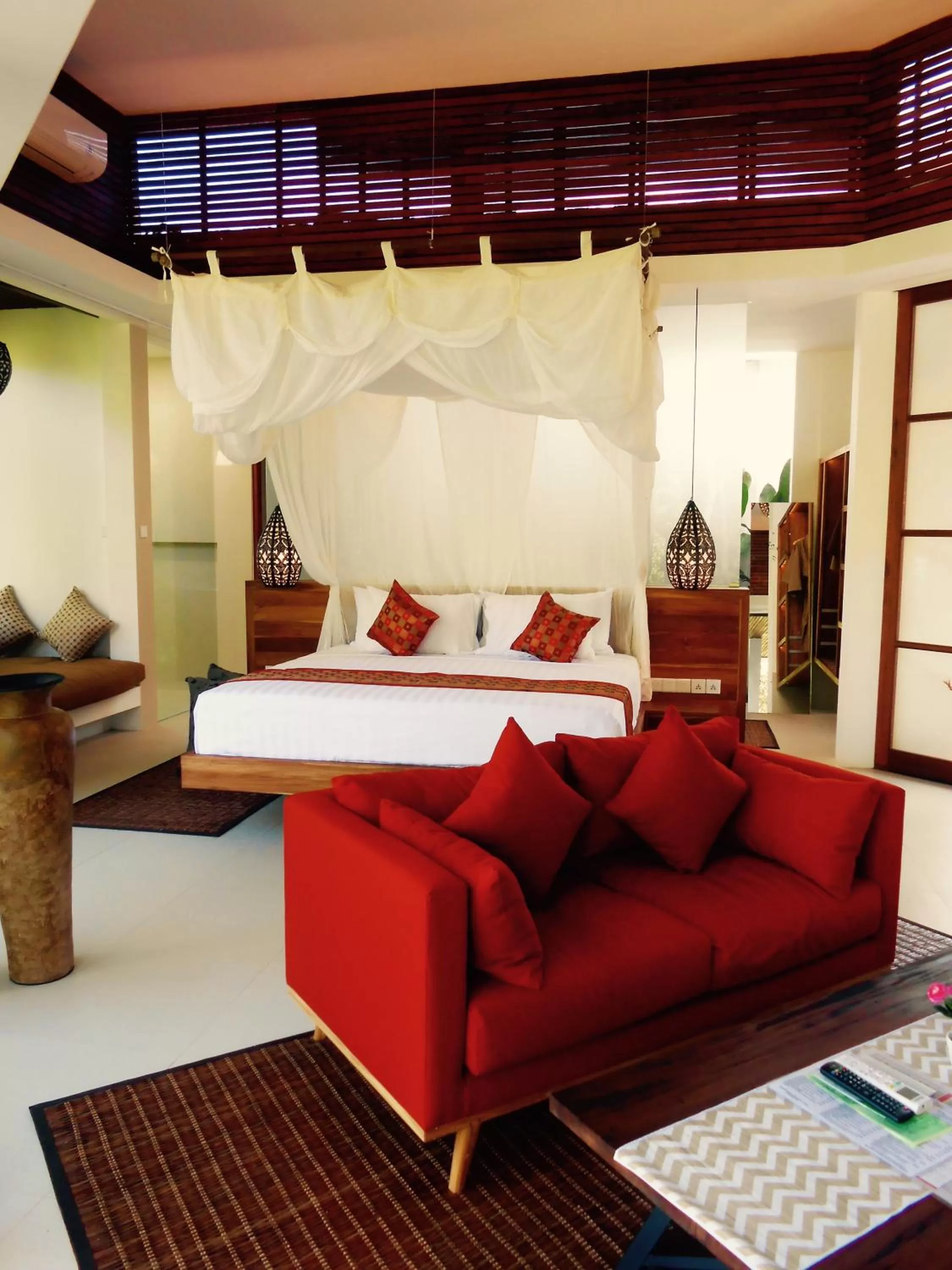 Living room, Bed in Cahaya Indah Villas