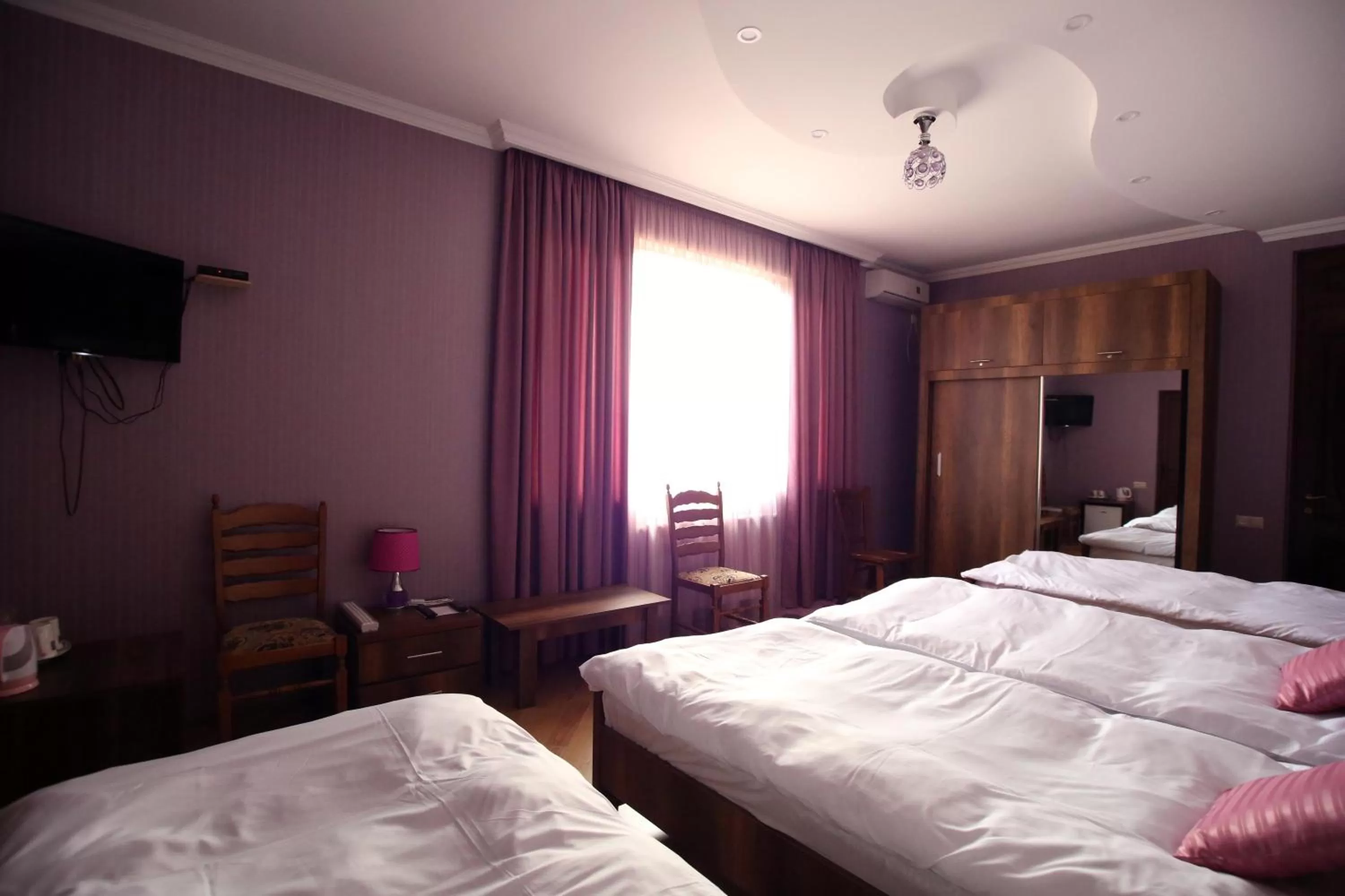 City view, Bed in Hotel Harmony