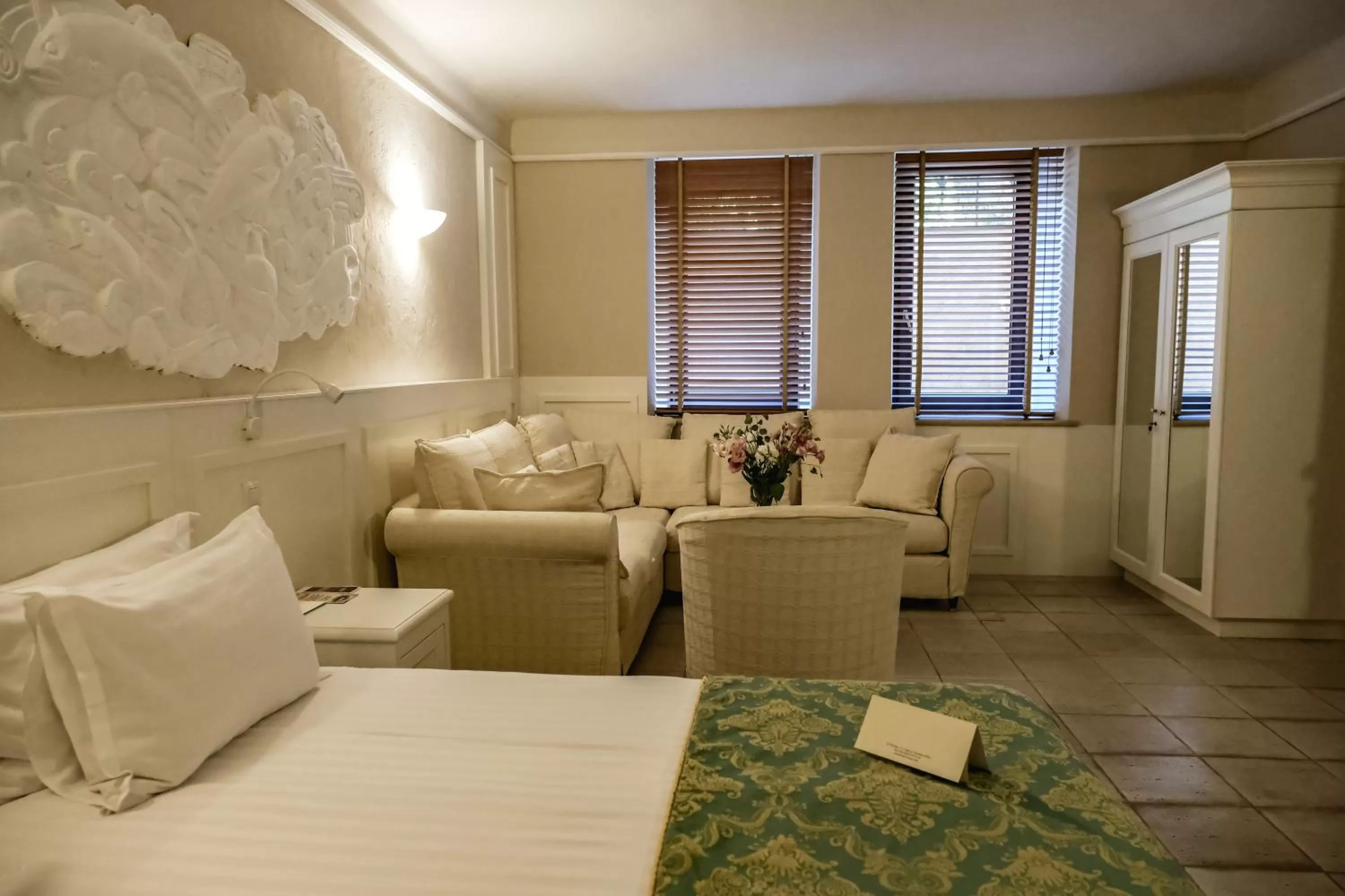 Seating area, Bed in Hotel Otrada