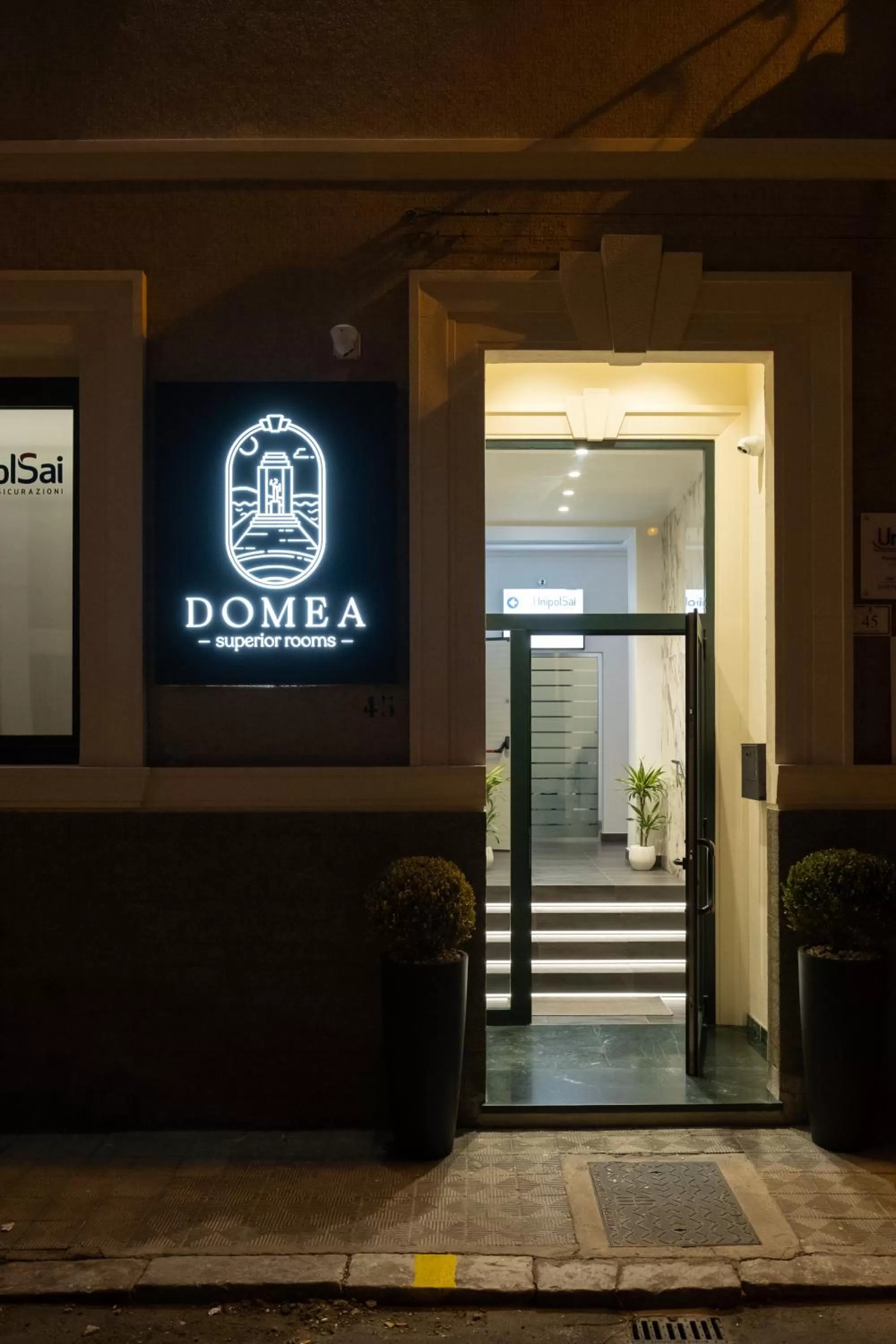 Property logo or sign in Domea Superior Rooms Bed and Breakfast