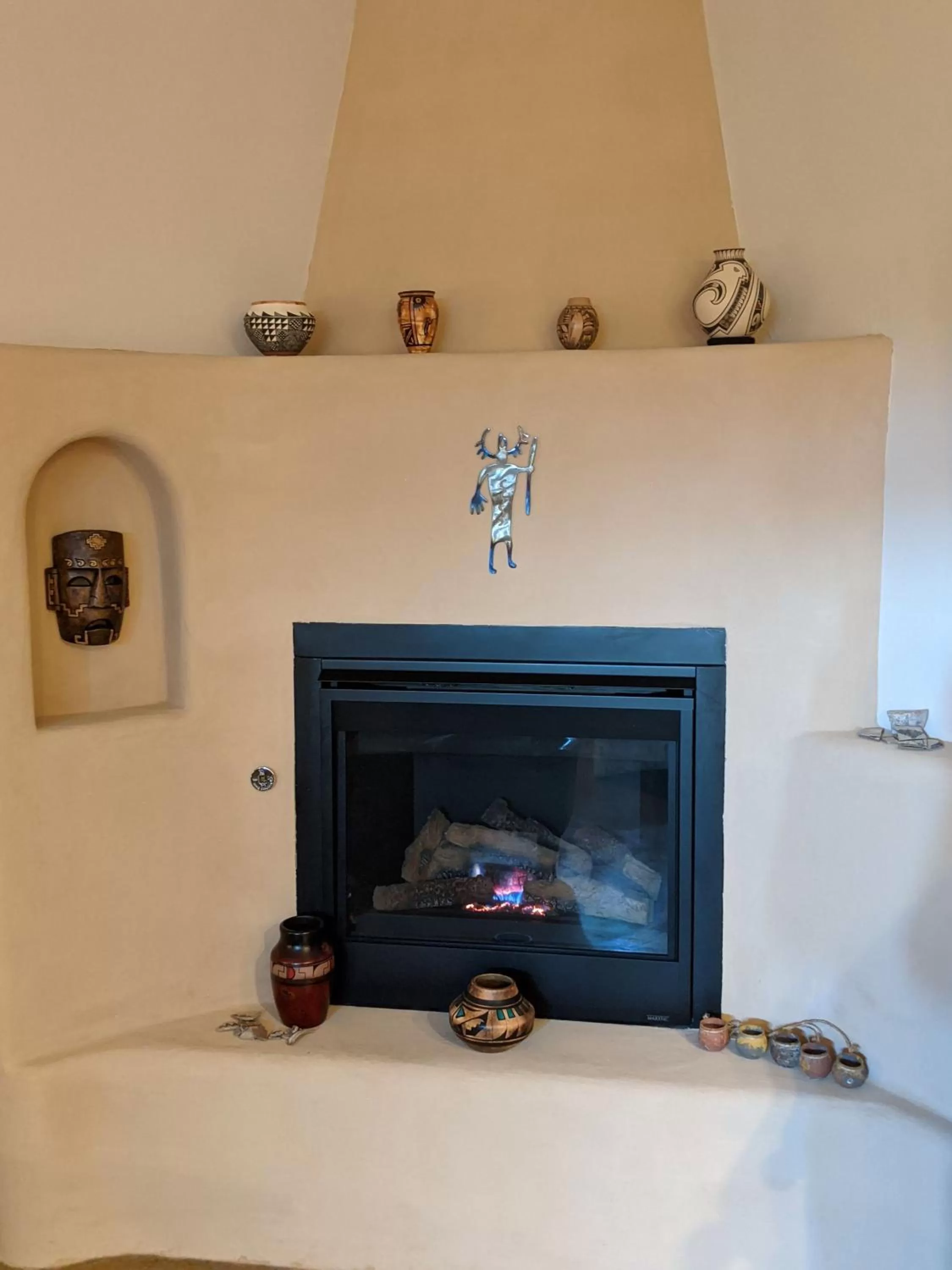 flat iron, TV/Entertainment Center in Origins Bed and Breakfast