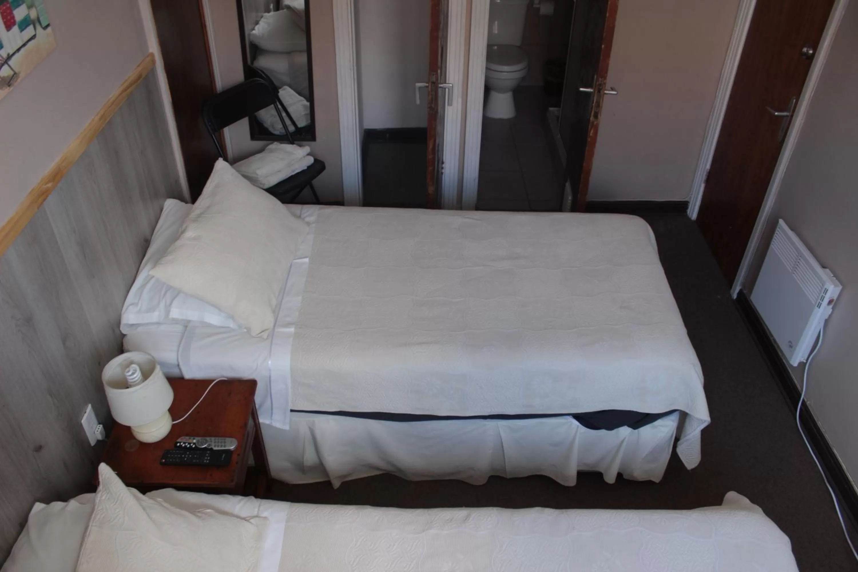 Bed in Alhambra Hotel