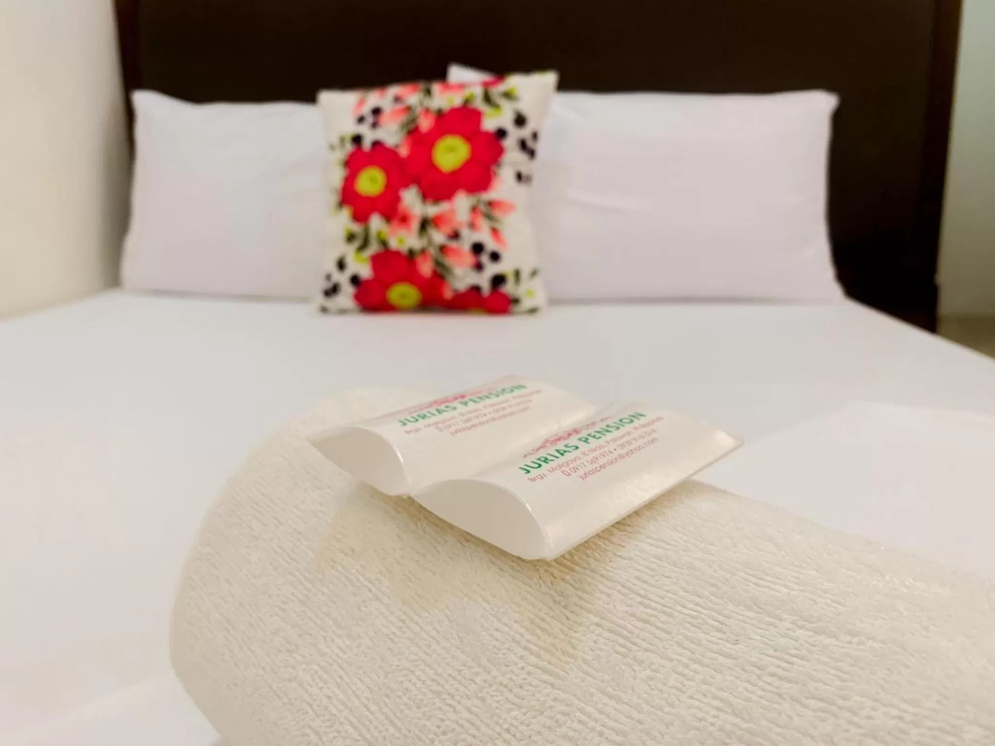 Bed in Jurias Garden Hotel