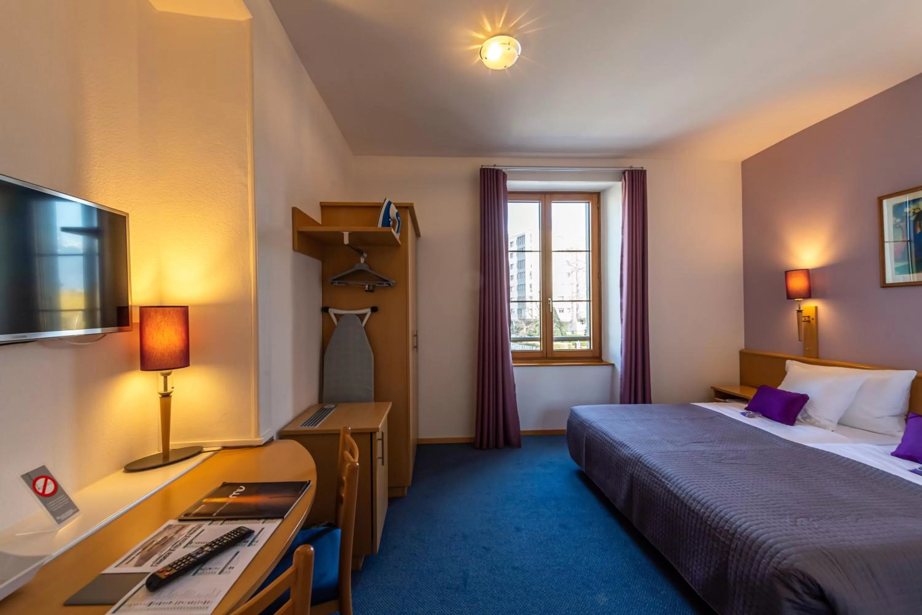 Bed in Hôtel Bon Rivage