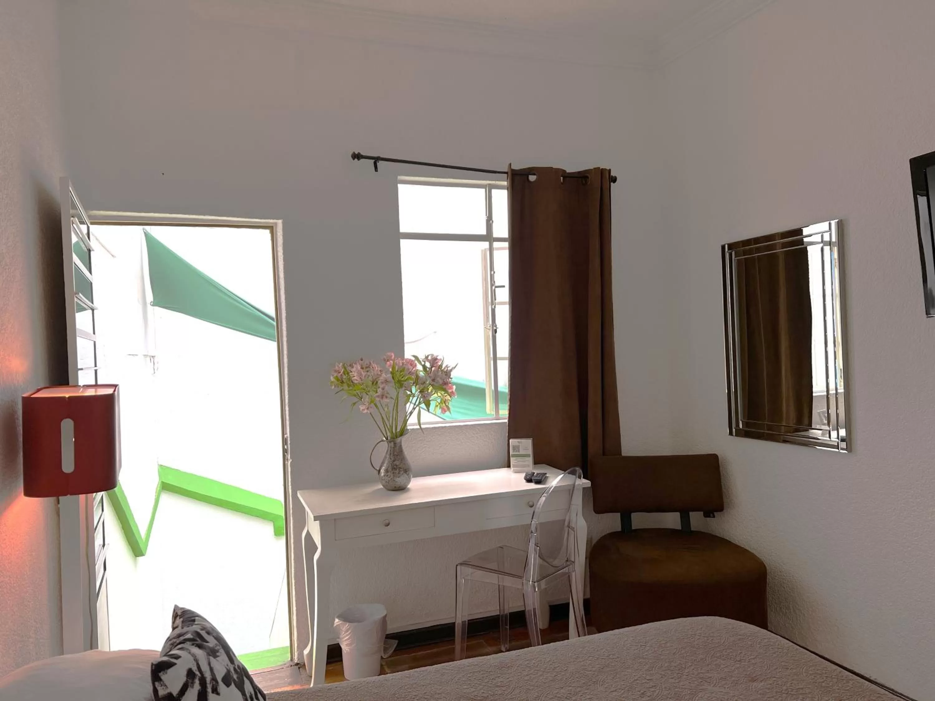 Photo of the whole room in Distrito Condesa Rooms and Studios