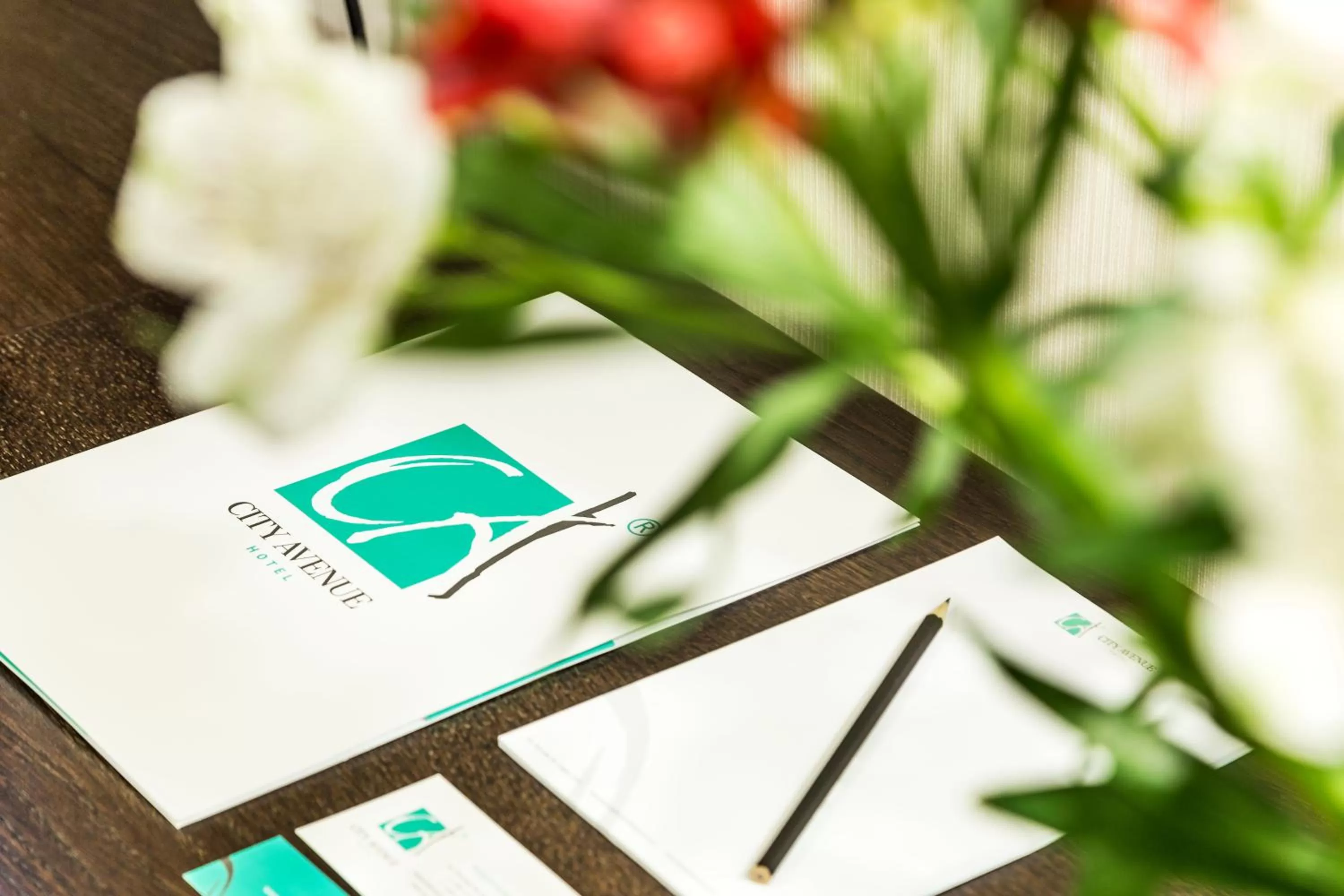 Property logo or sign in City Avenue Hotel by HMG-Free Parking-Free Wi-Fi