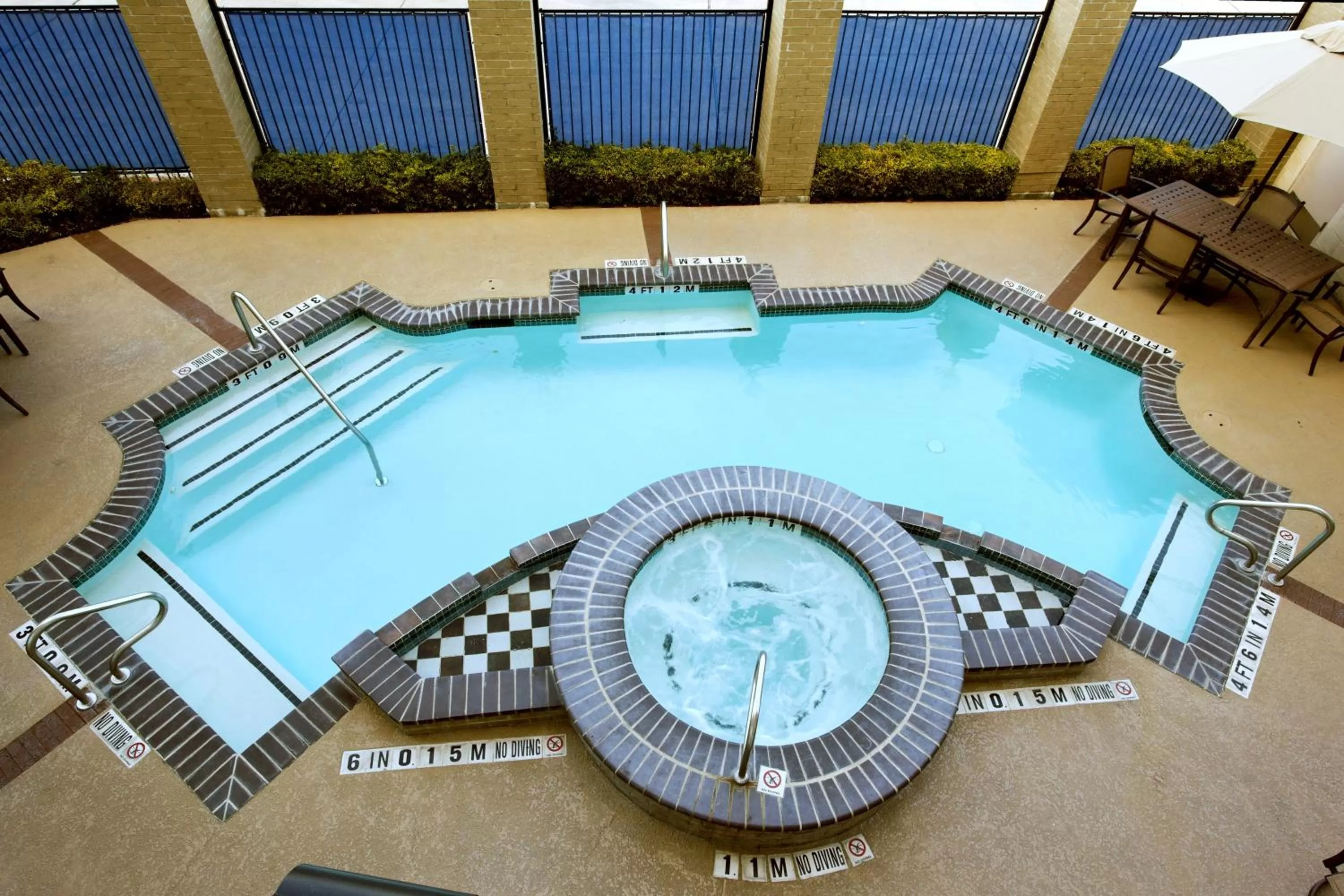 Swimming pool in Holiday Inn Express Hotel & Suites San Antonio - Rivercenter Area by IHG