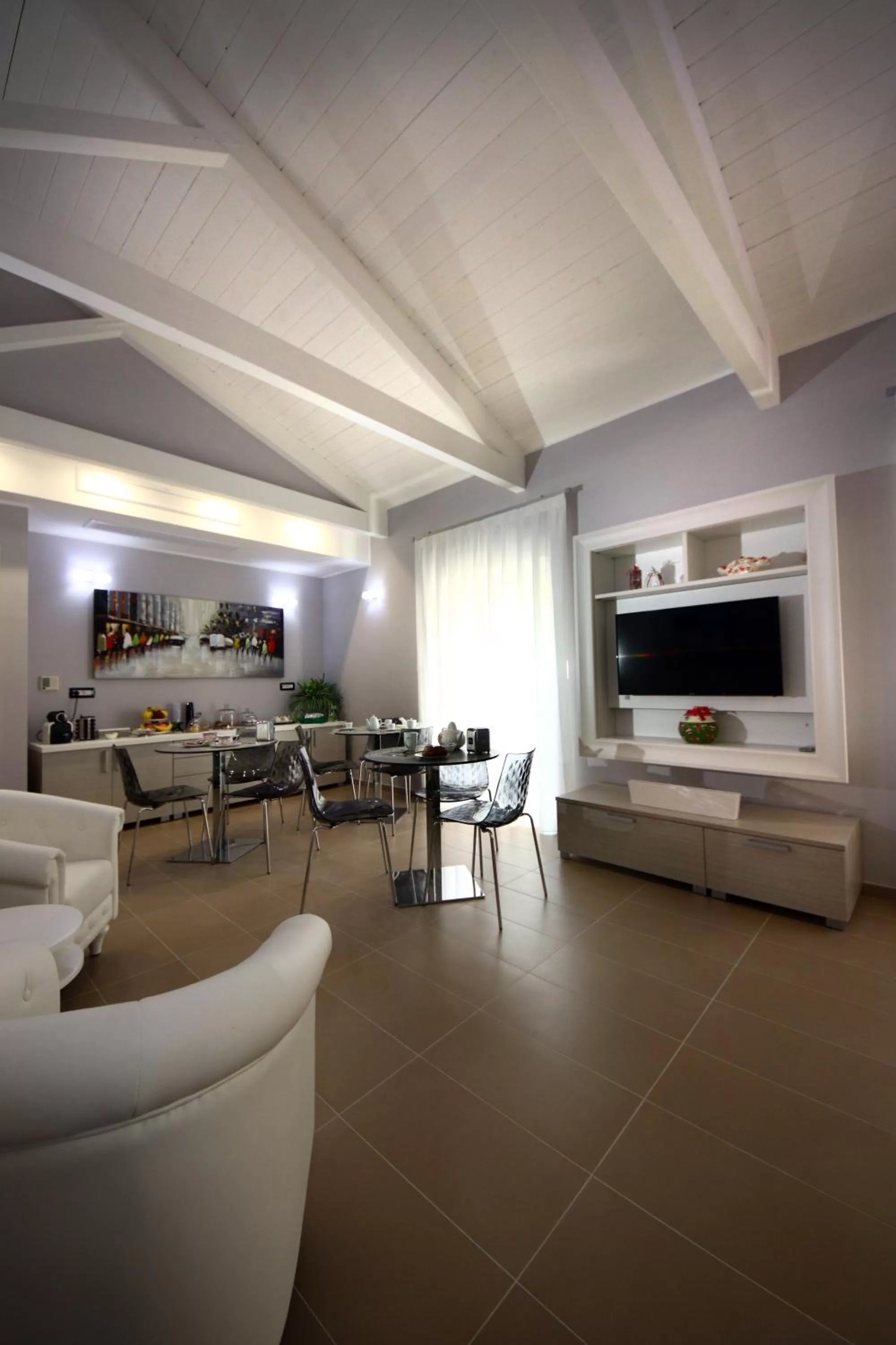 Communal lounge/ TV room in La Corte del Geco