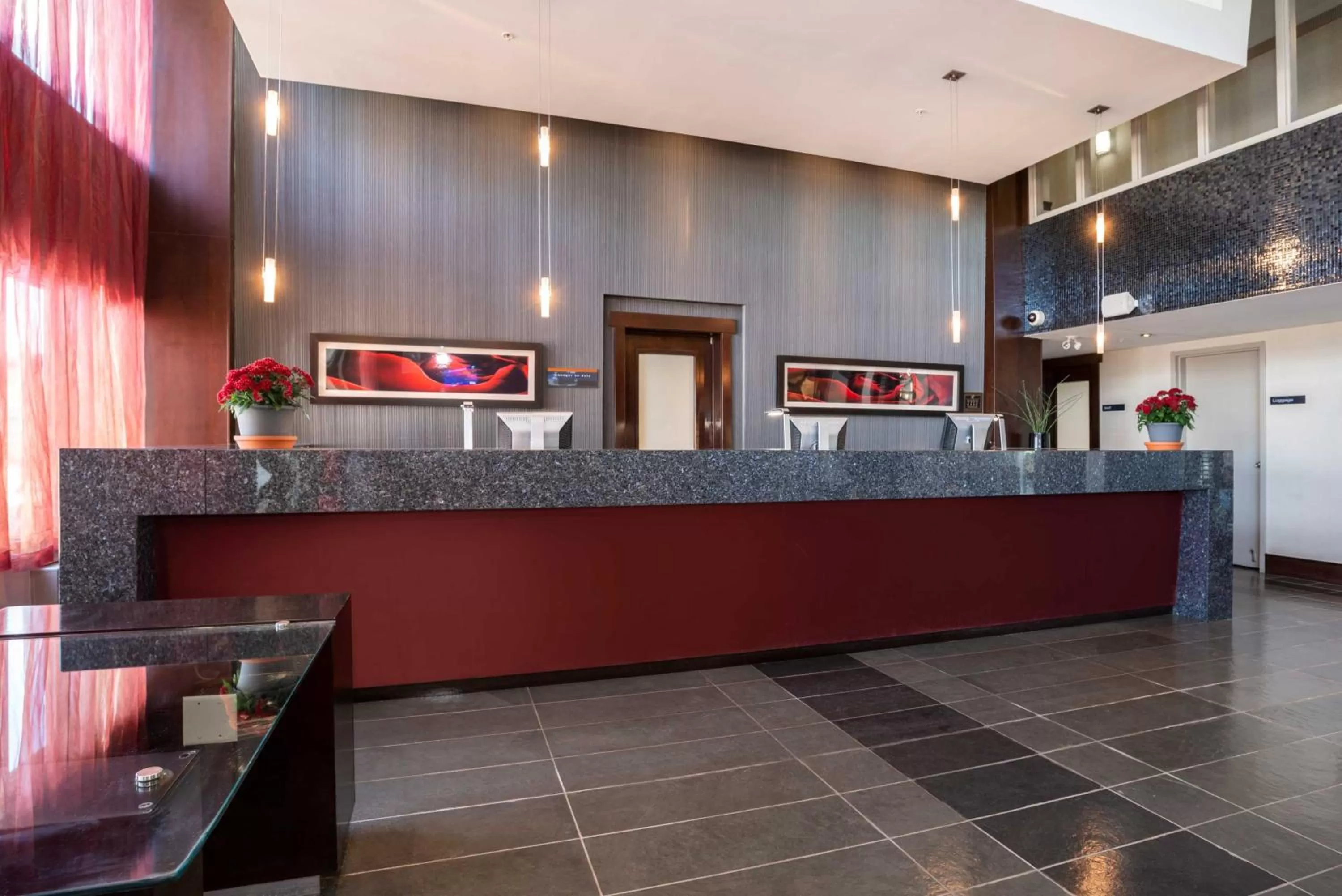 Lobby or reception in Sandman Hotel & Suites Winnipeg Airport