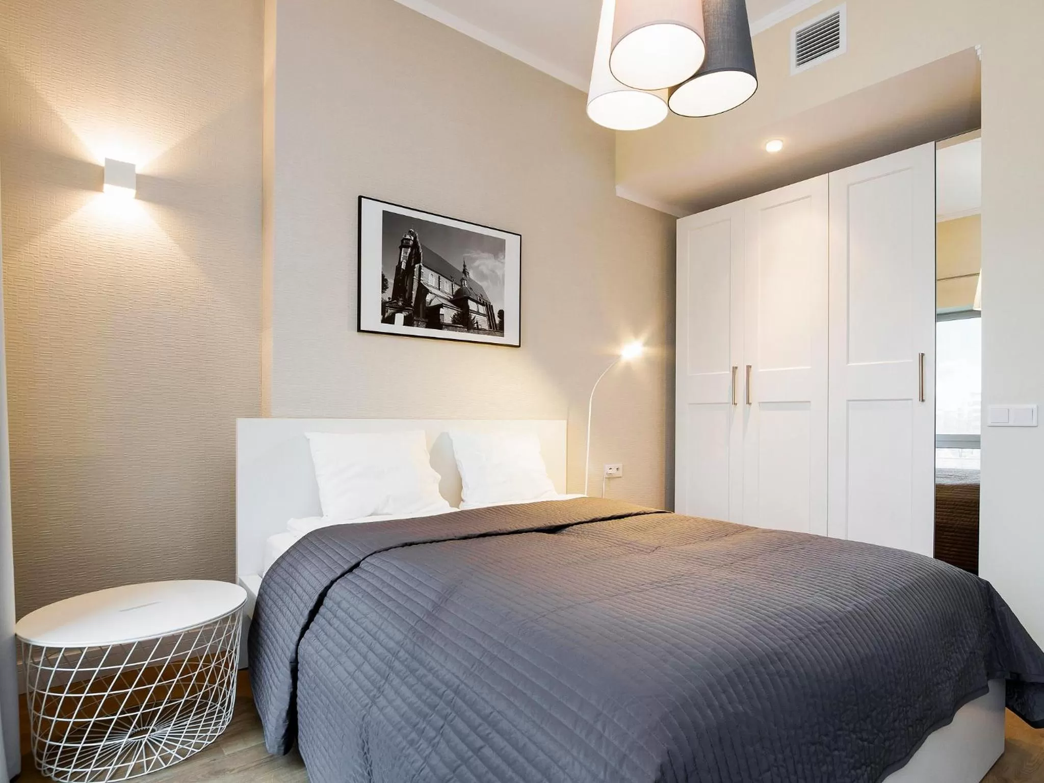 Bed in Riverside Aparthotel Cracow