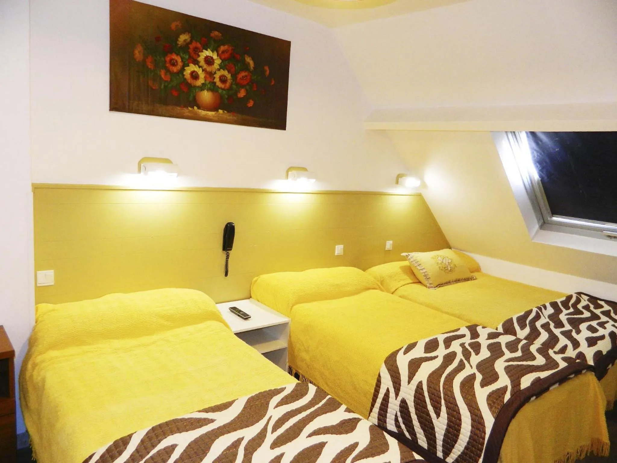 Bed in Hotel Paris Star