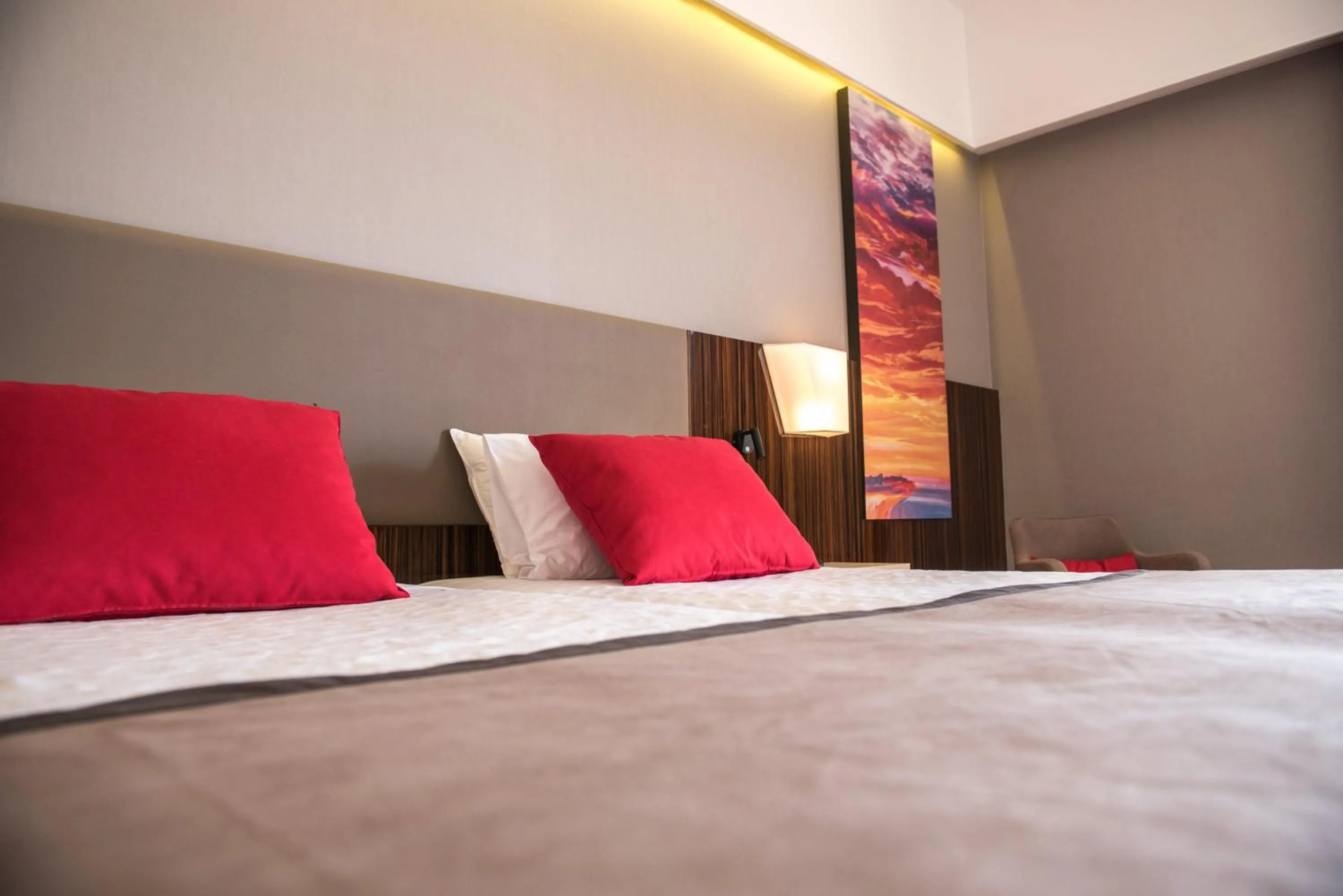 Decorative detail, Bed in Ramada Plaza by Wyndham Thraki