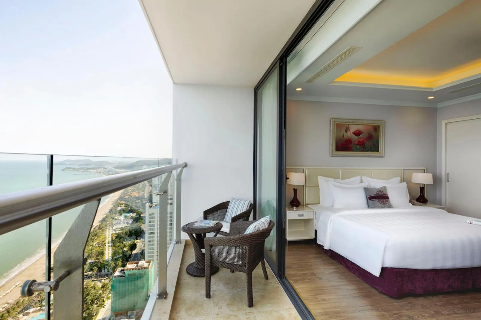 Balcony/Terrace, Bed in Vinpearl Beachfront Nha Trang