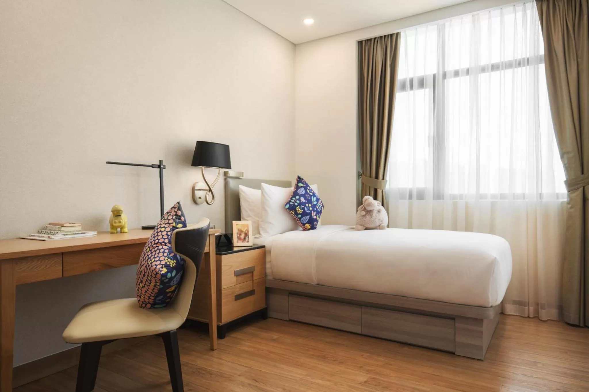 Bedroom, Bed in Oakwood Residence Saigon