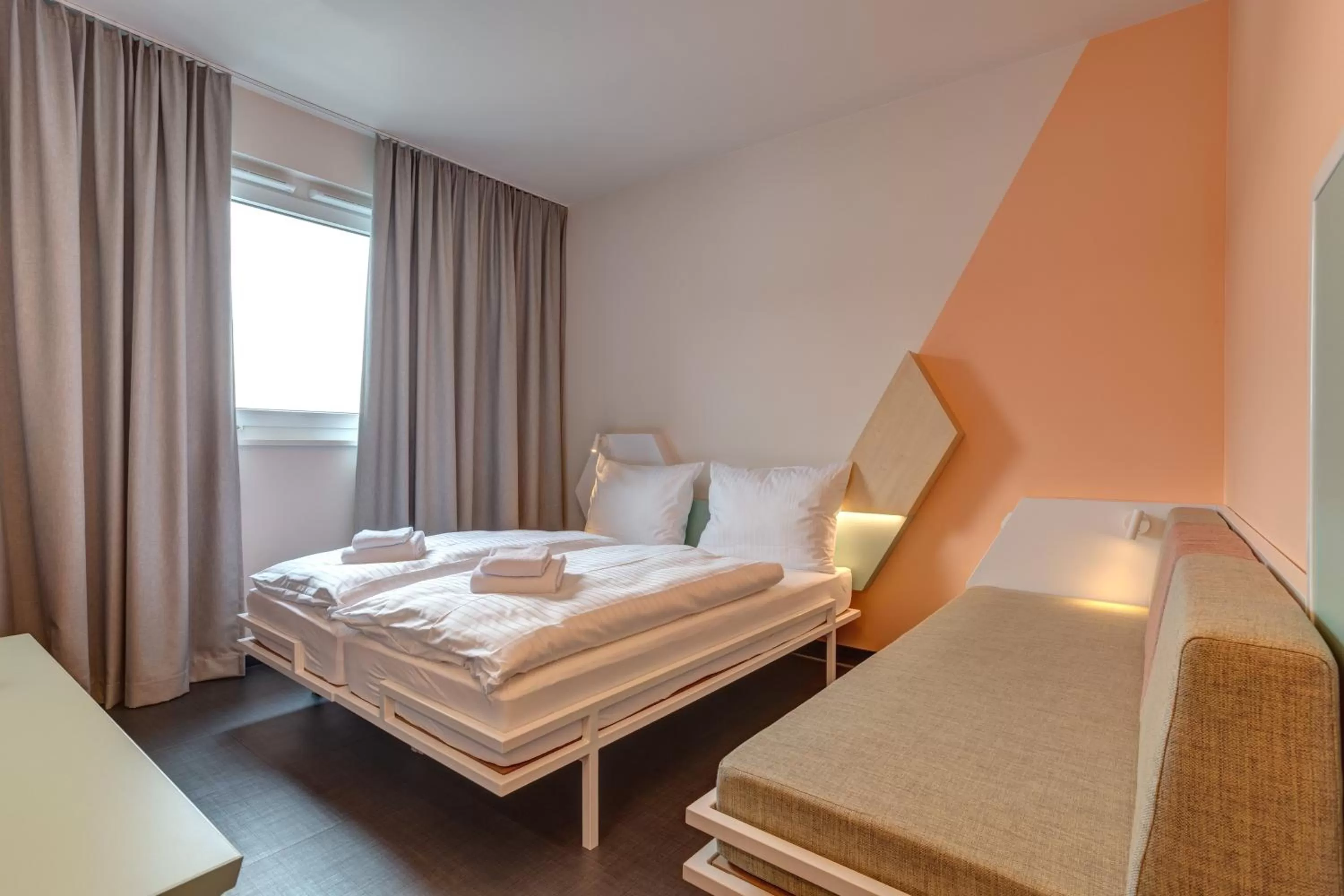 Photo of the whole room, Bed in MEININGER Hotel Heidelberg Hauptbahnhof