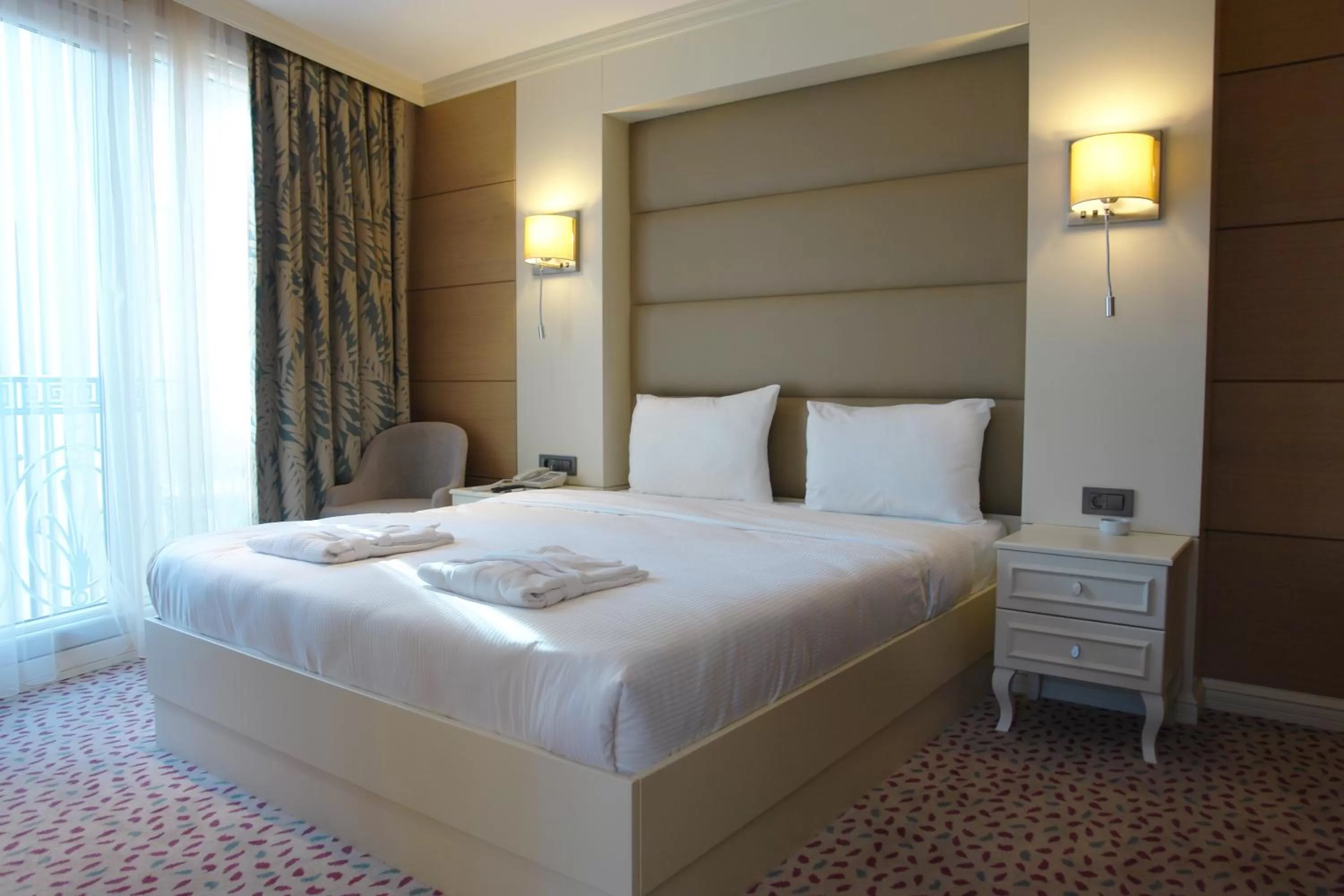 Bed in Hotel Le Mirage