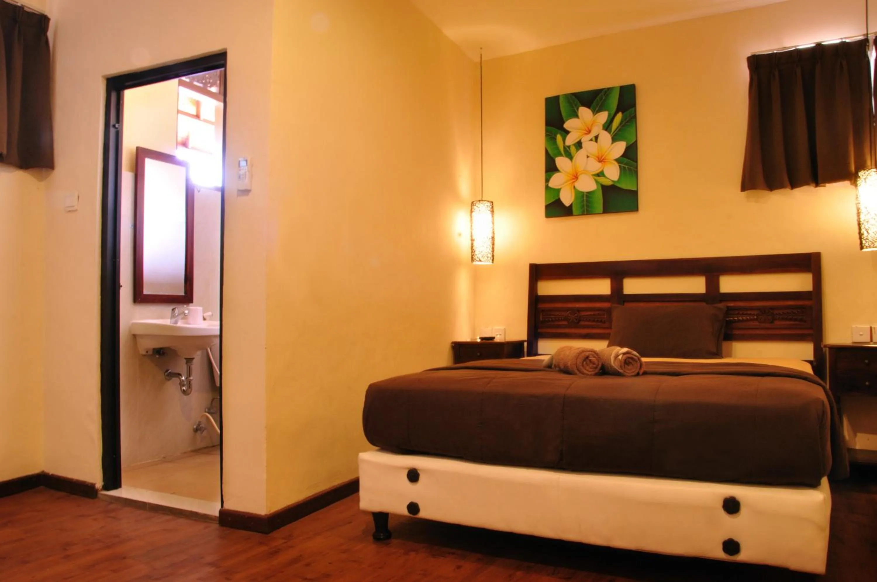 Bed in Bemo Corner Guest House