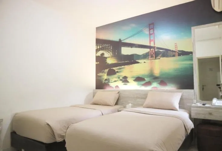 Bed in De Green Inn at Aeropolis