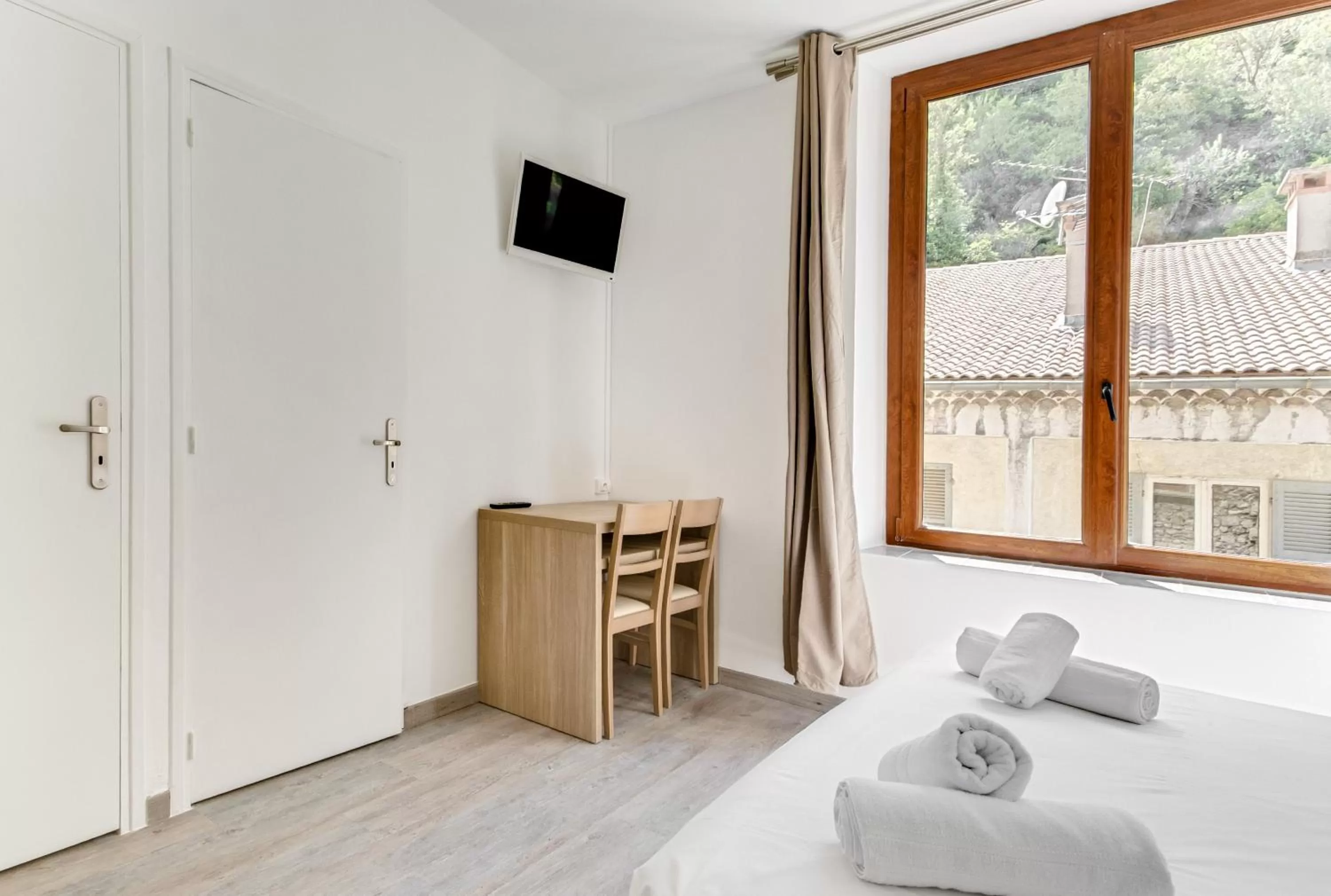 Bed in Hôtel de la Citadelle