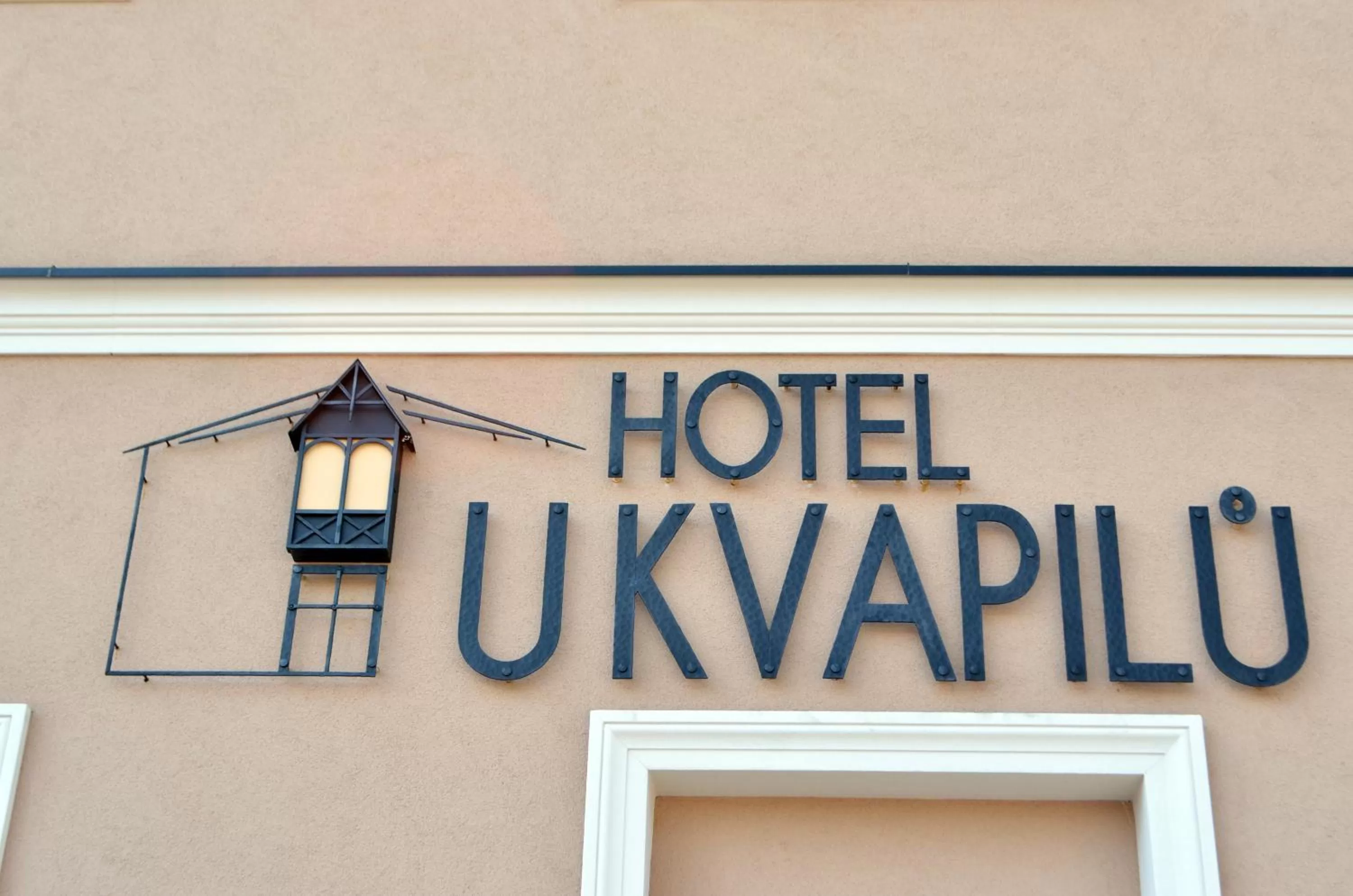 Property logo or sign in Hotel U Kvapilů