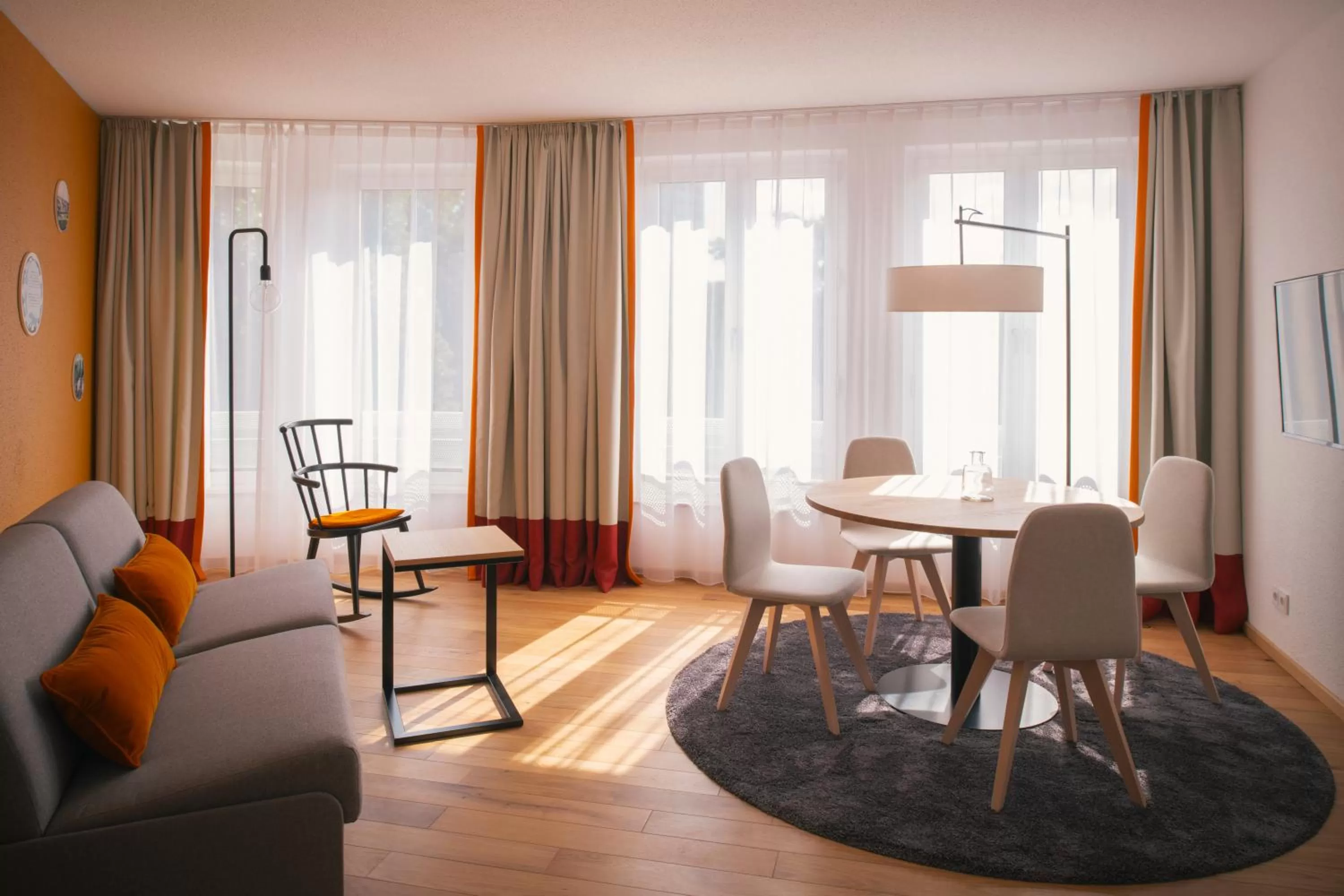 Living room in Vienna House Easy by Wyndham Leipzig