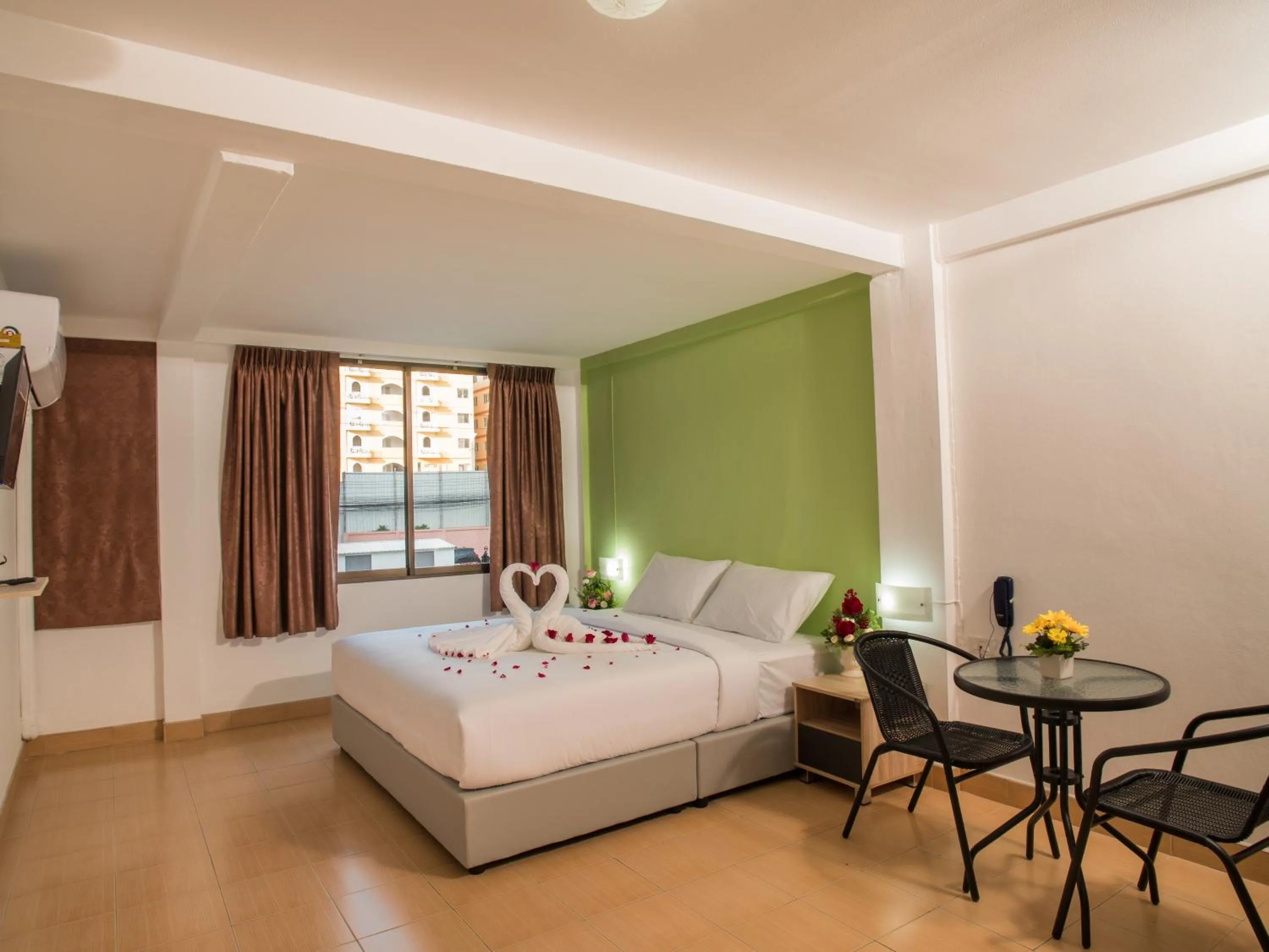 Living room, Bed in TJ Guesthouse