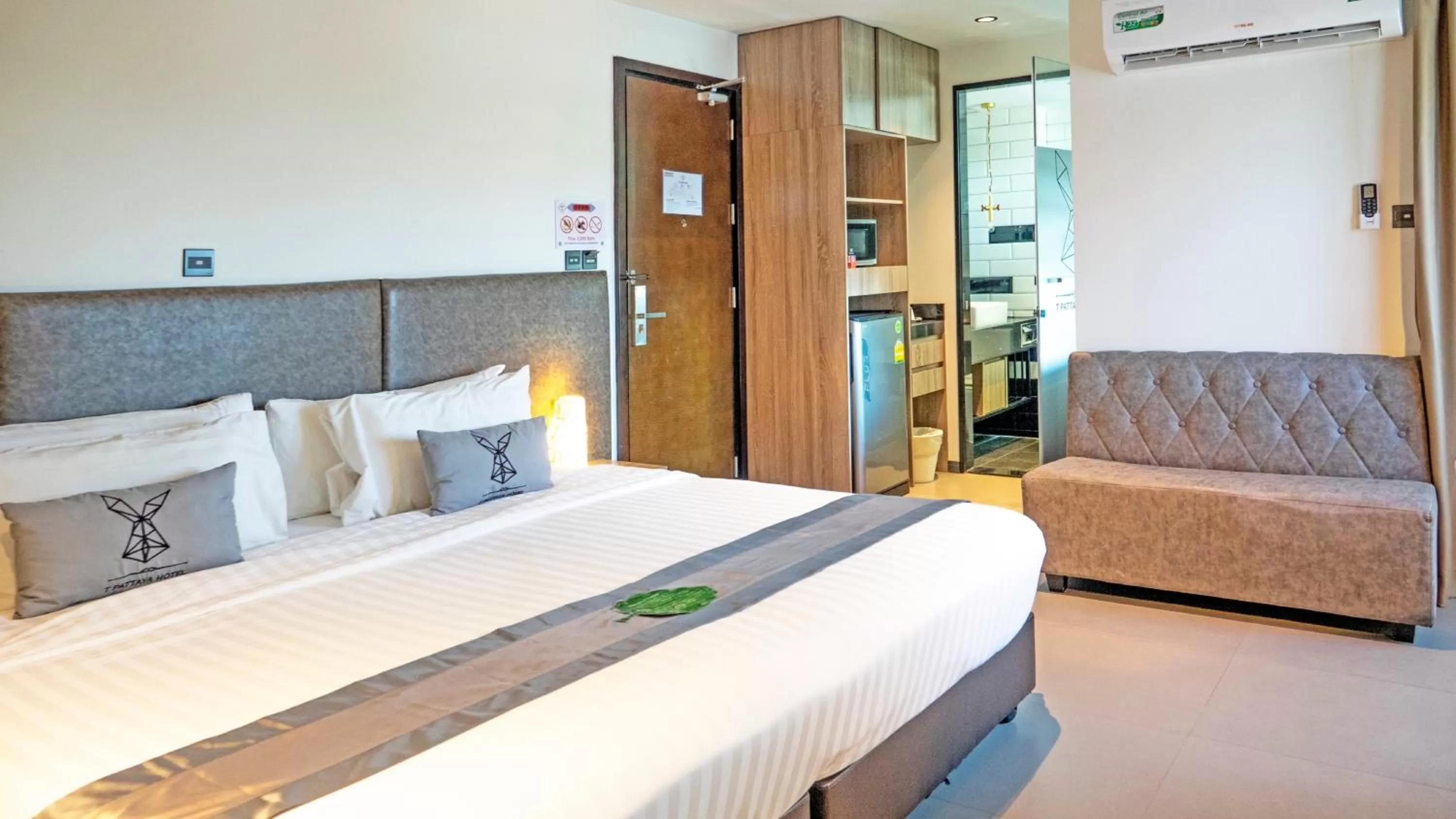 Bed in SureStay Plus by Best Western T Pattaya