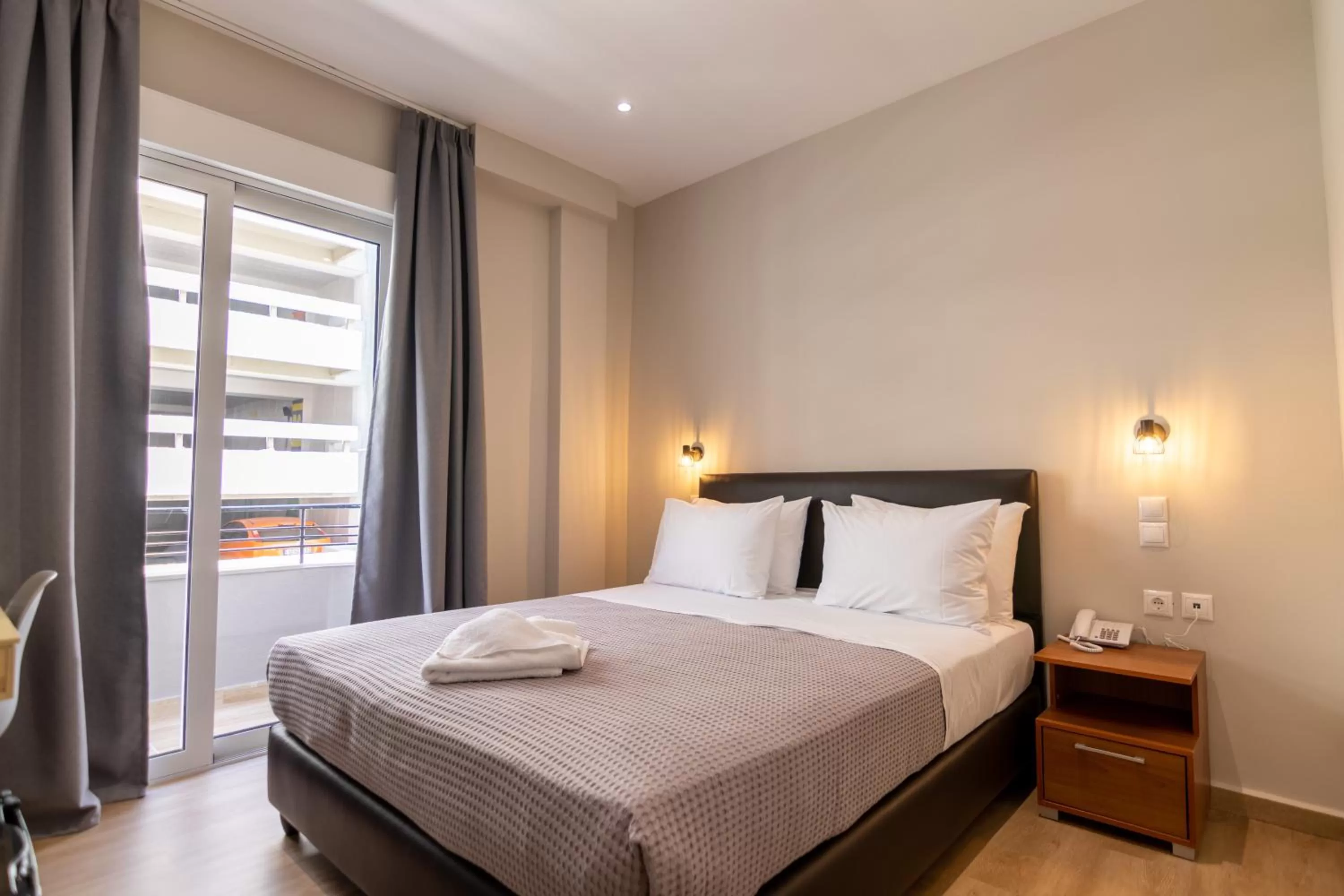 Bed in New Amaryllis Hotel