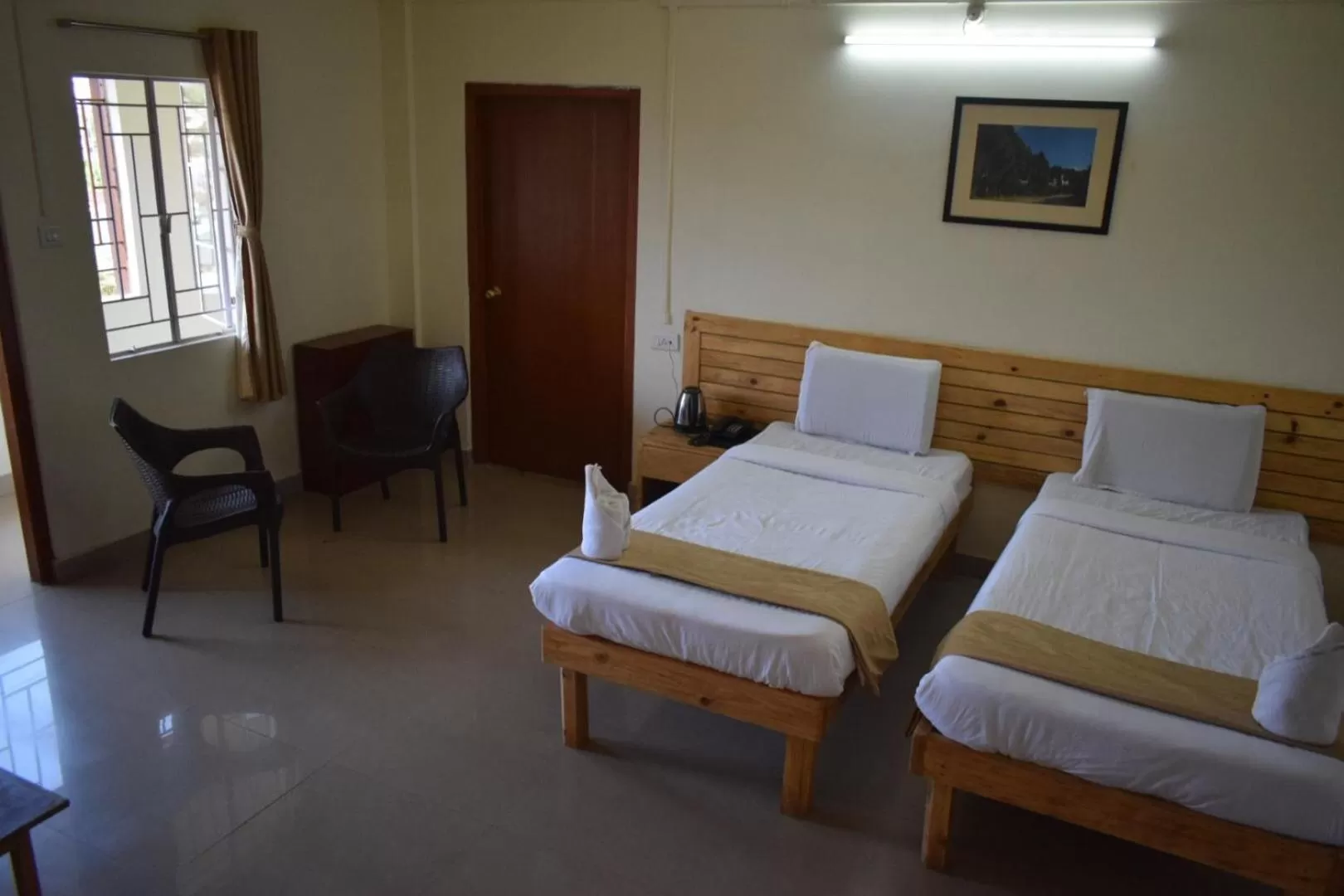 Bed in Hotel Travellers INN