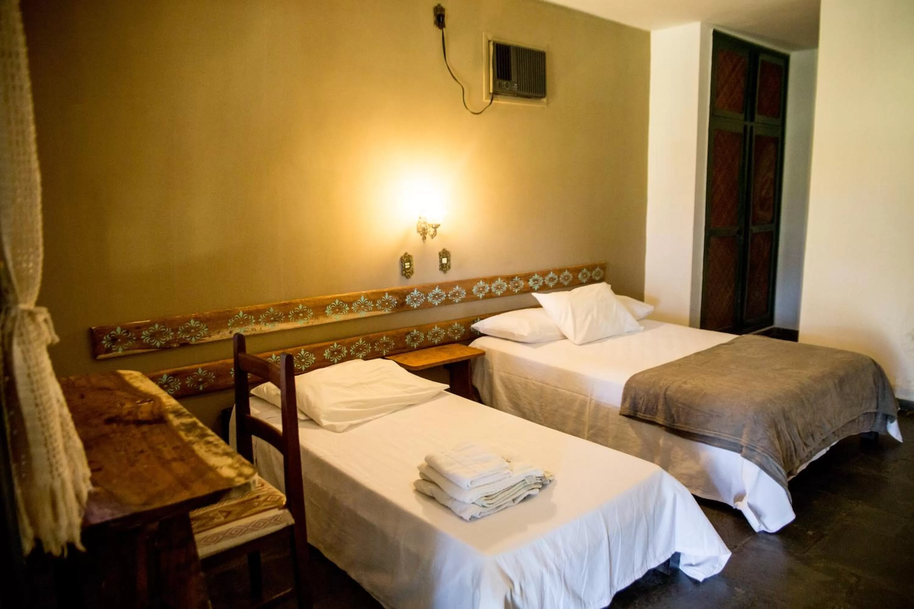 Bed in Pousada Flor da Serra