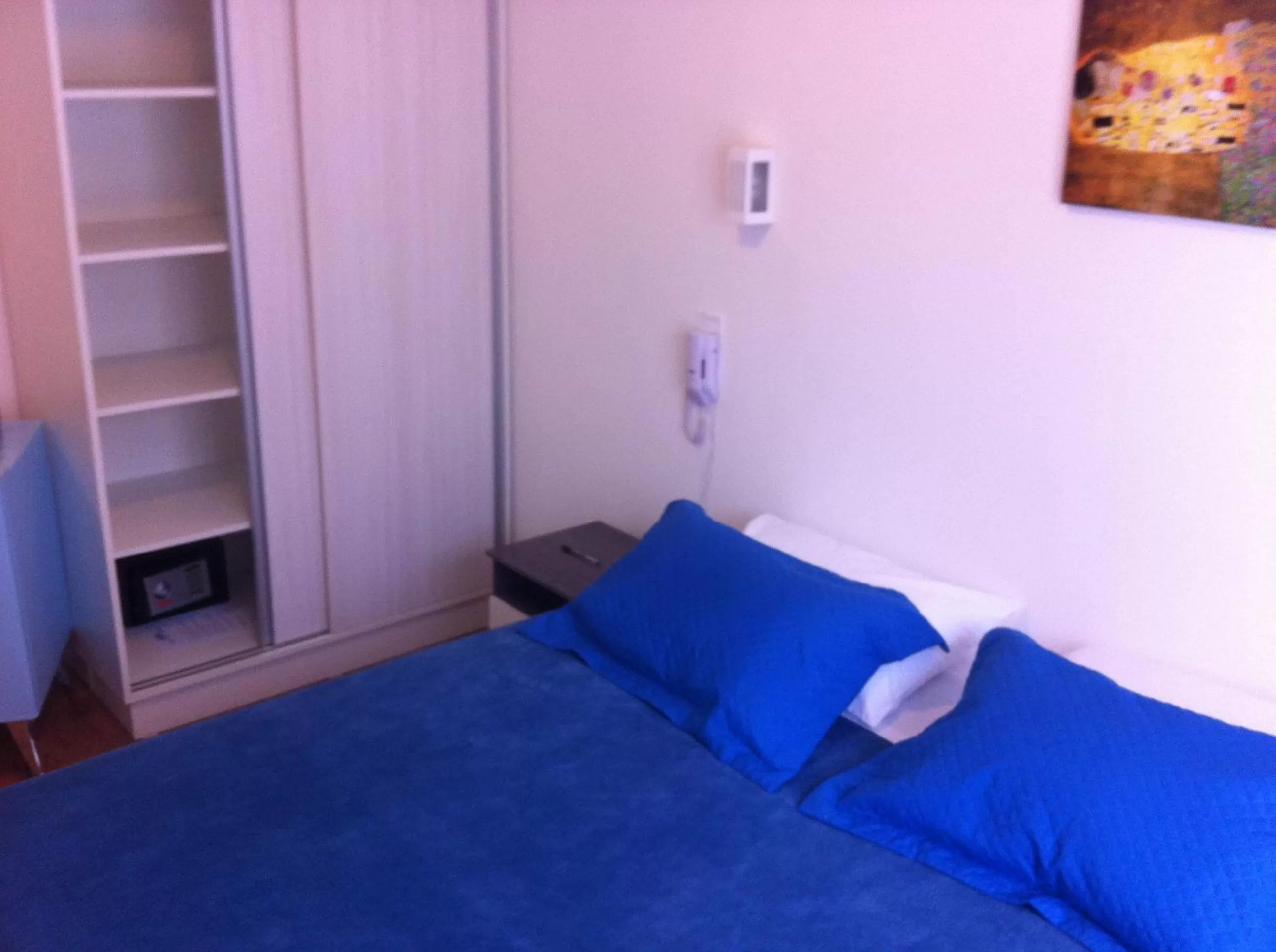 Bed in The Hyperion Boutique Hotel