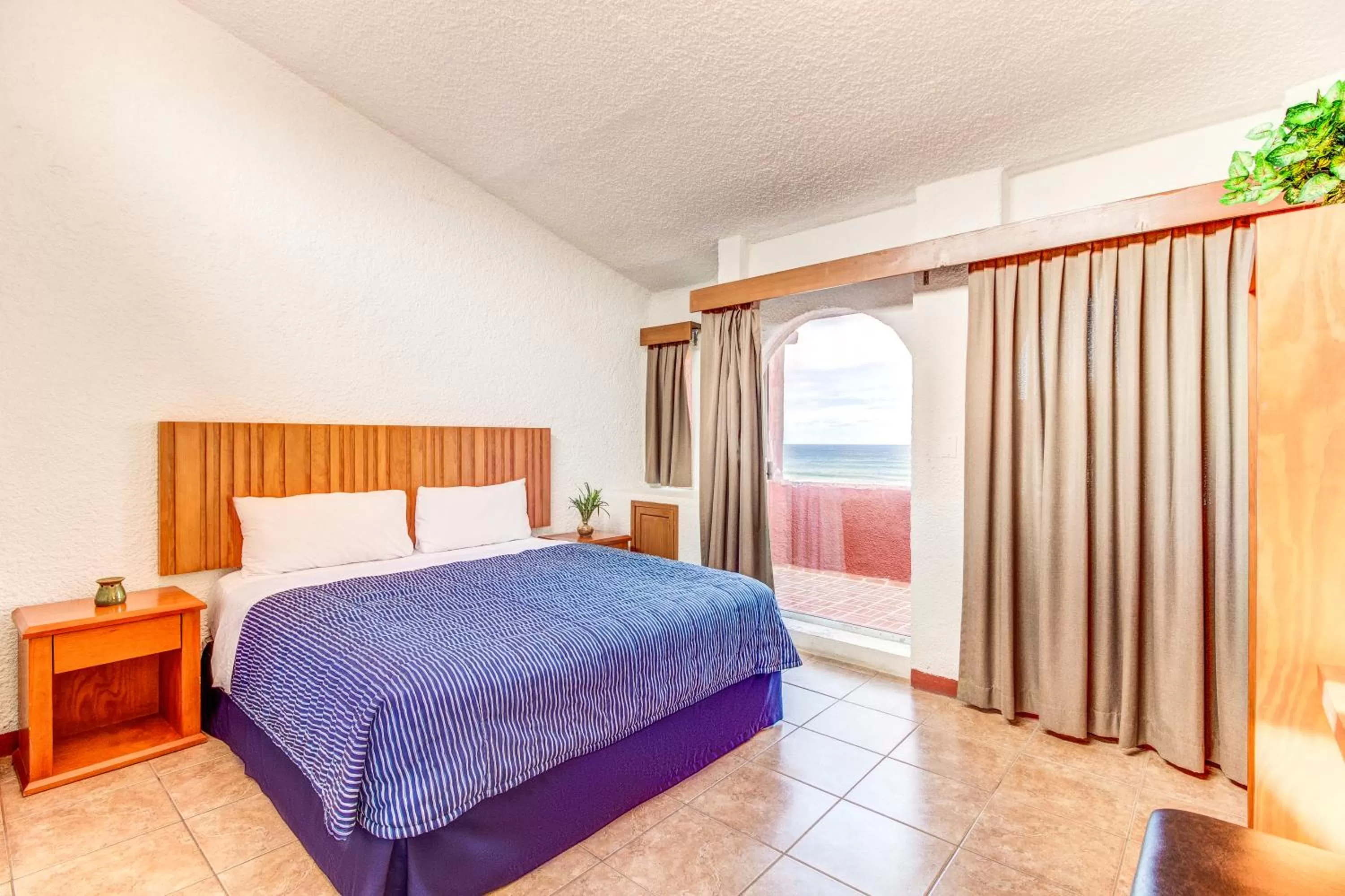 Bed in Puerto Nuevo Baja Hotel & Villas