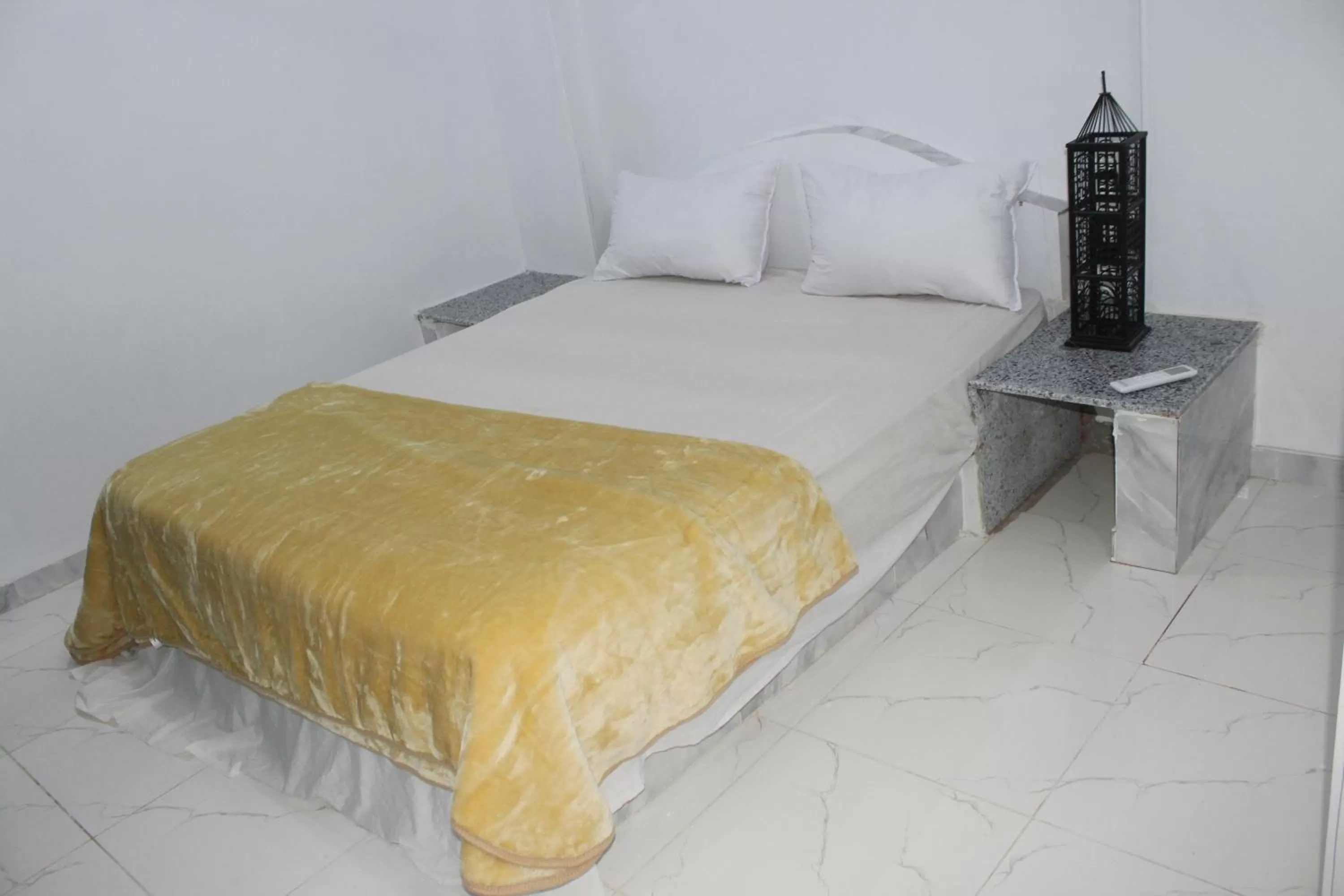 Bed in Mama Africa Apts & Studios