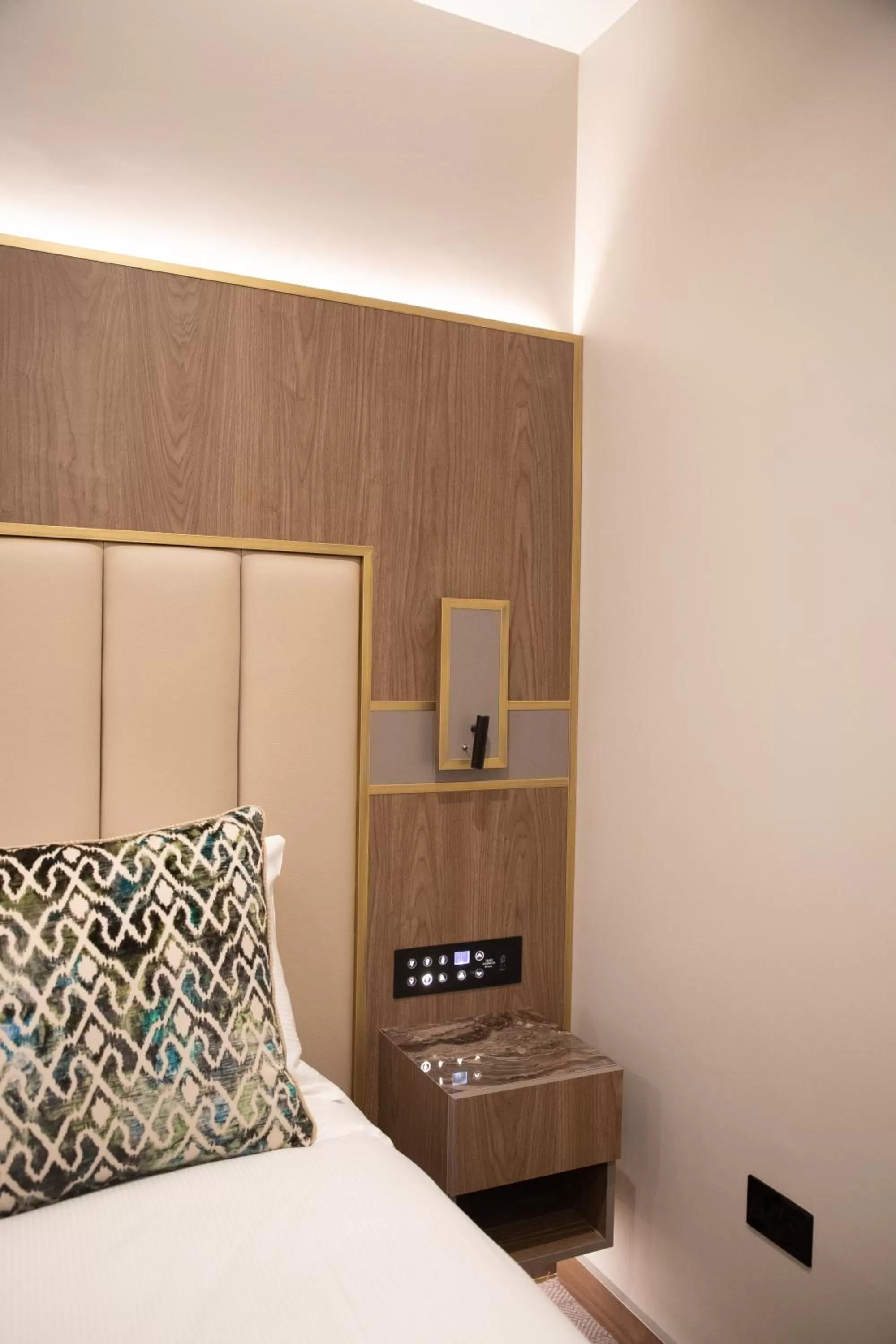 Bed in Merit Kensington Hotel