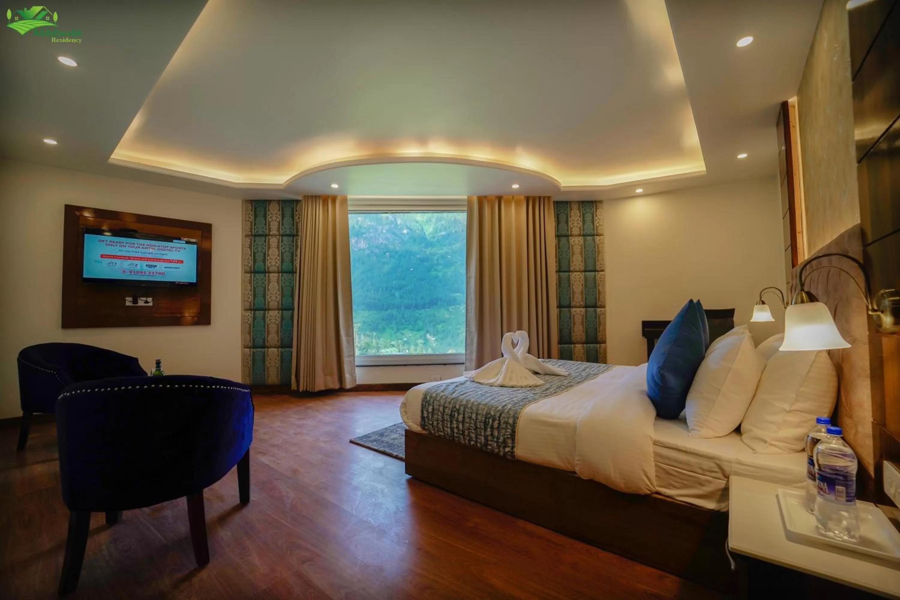 Photo of the whole room, Bed in Abhilashi Residency & Spa - Centrally Heated & Air Cooled