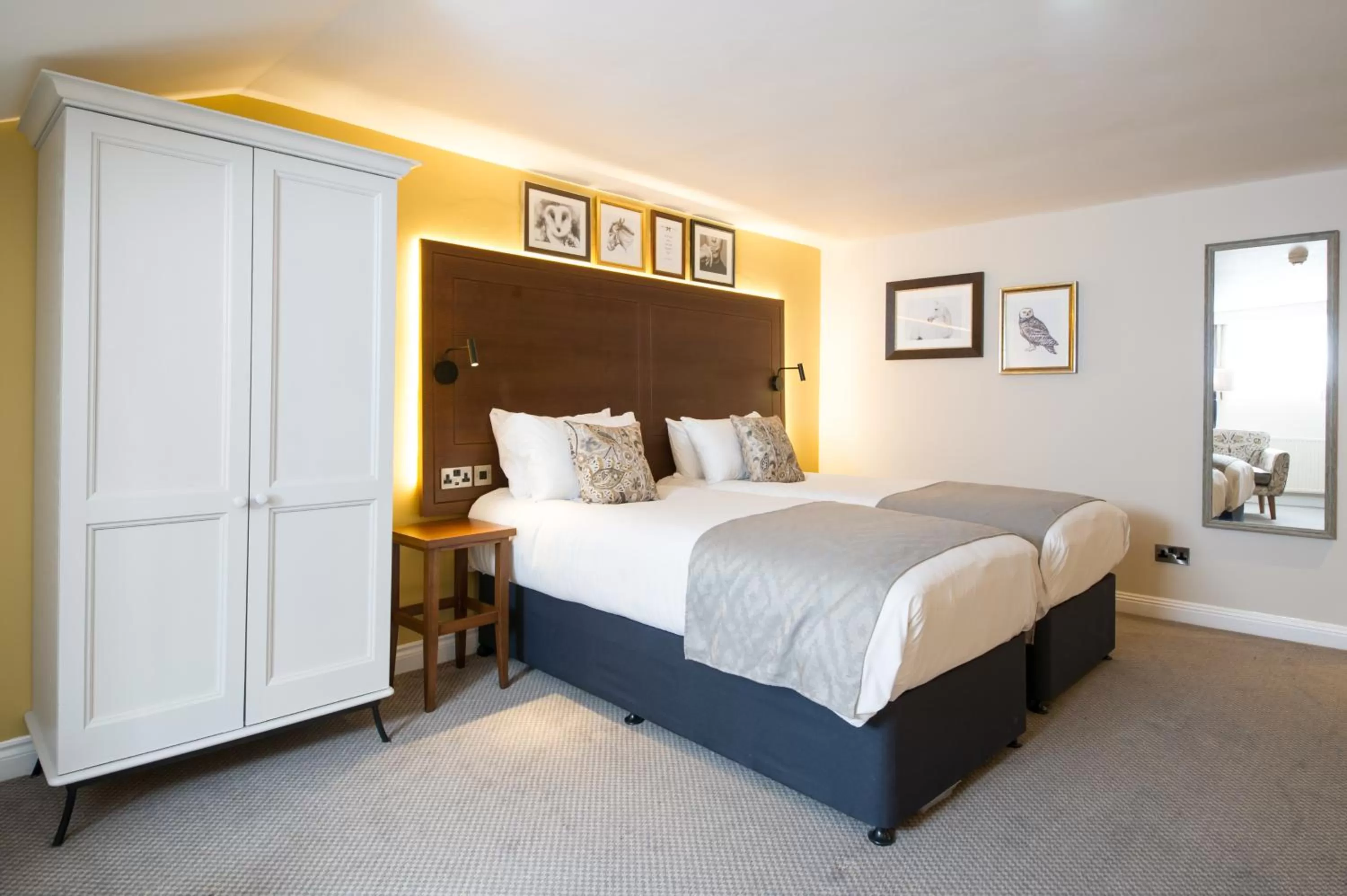 Bed in The Snowy Owl by Innkeeper's Collection