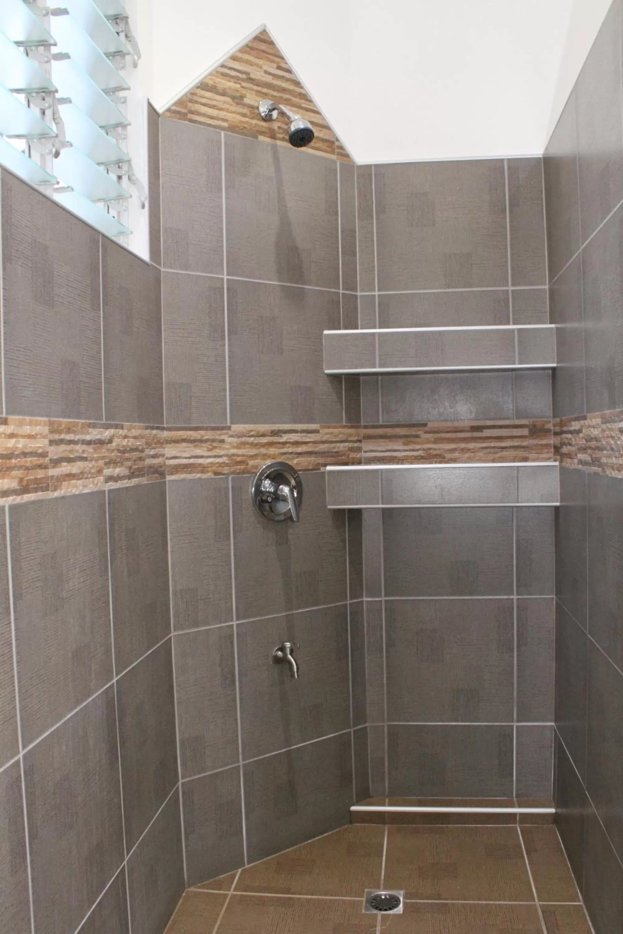 Shower in Alona's Coral Garden Resort (Adult-Only)