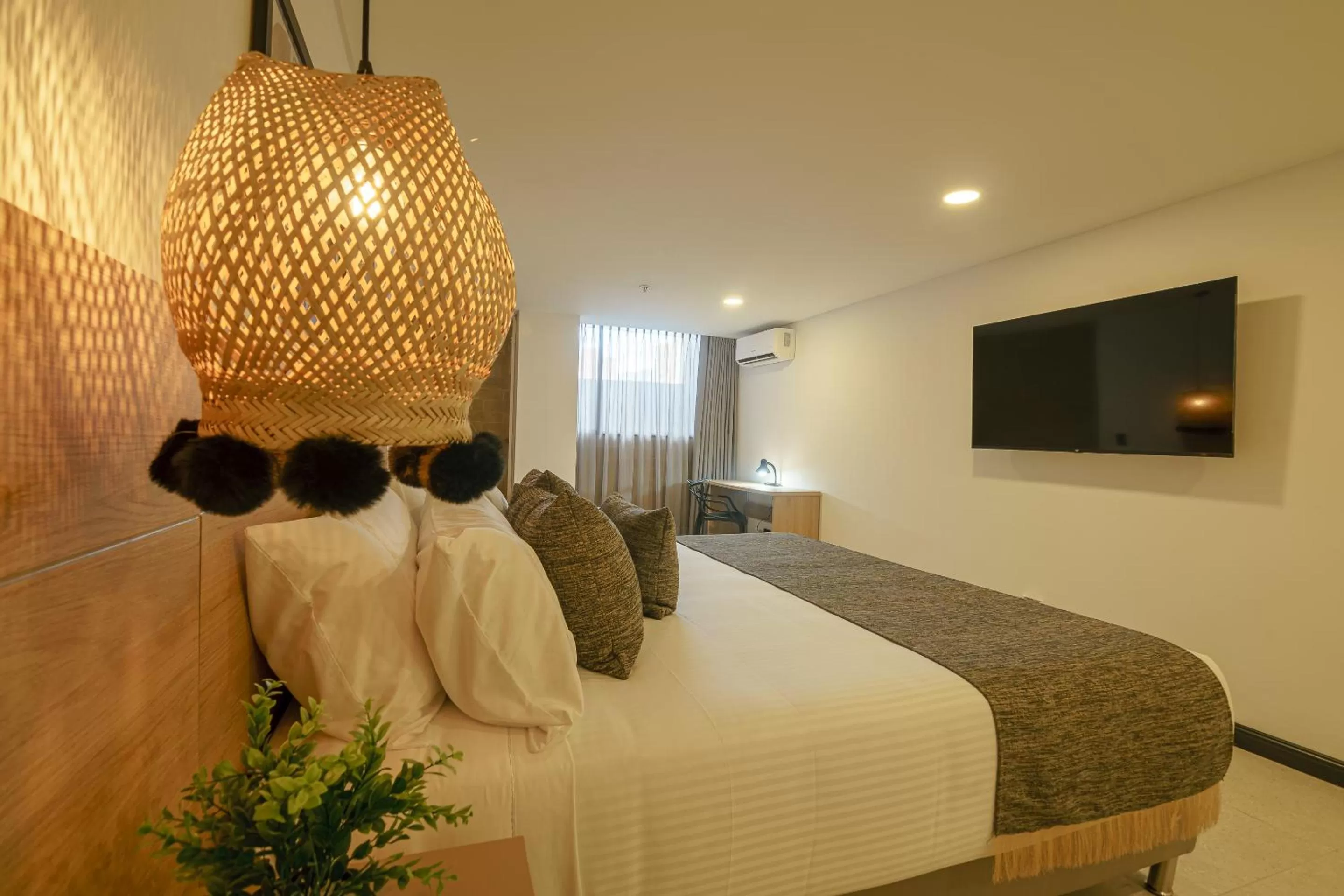 Photo of the whole room, Bed in First Class Hotel